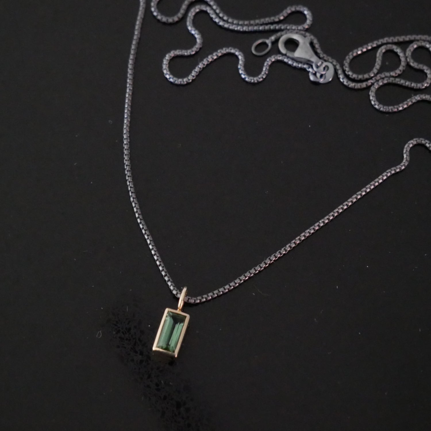 Tiny 9ct gold tourmaline baguette pendant