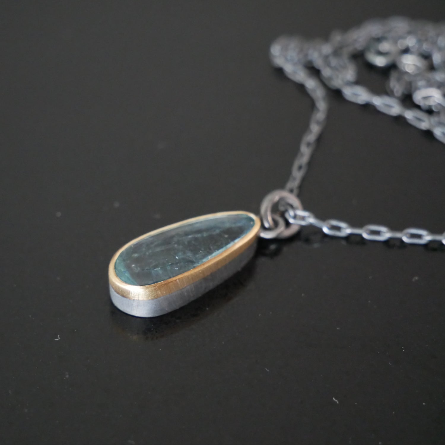 Gold and silver Aquamarine pendant