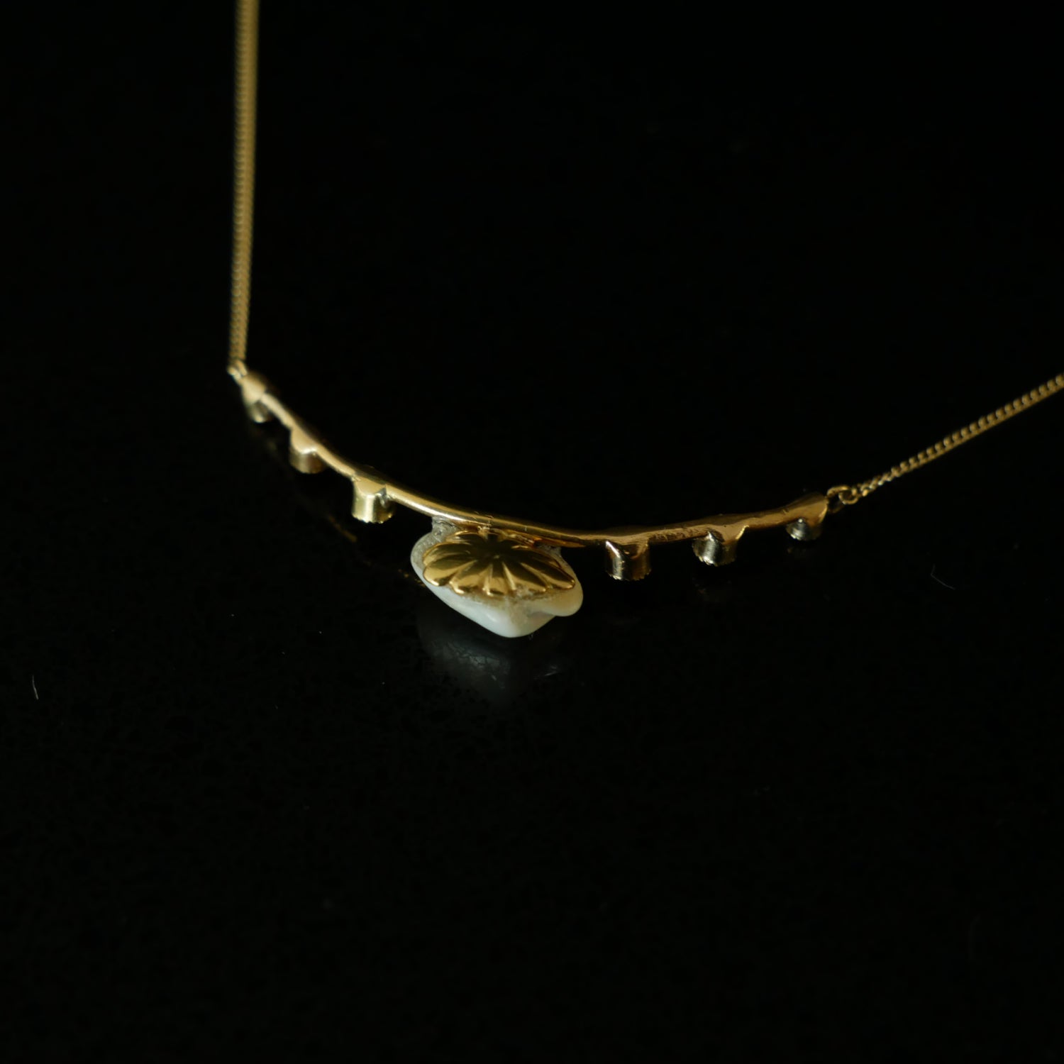 18ct gold baroque pearl and ruby necklace.