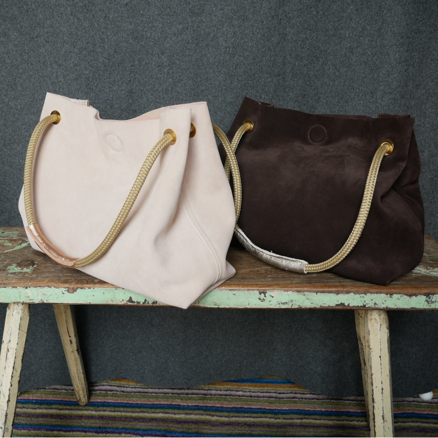 pink and brown suede bag