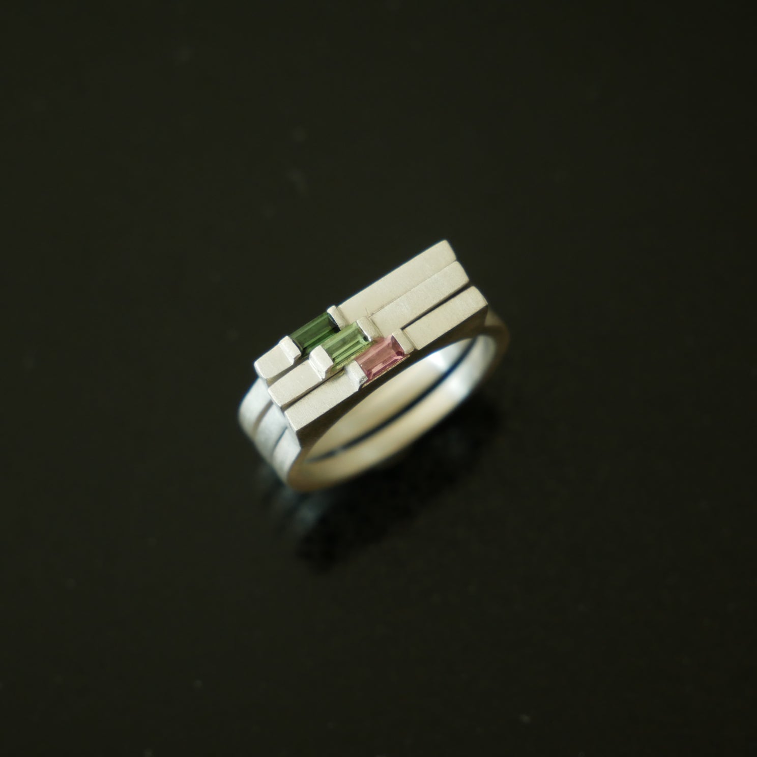Set of three narrow architect rings with baguette tourmalines