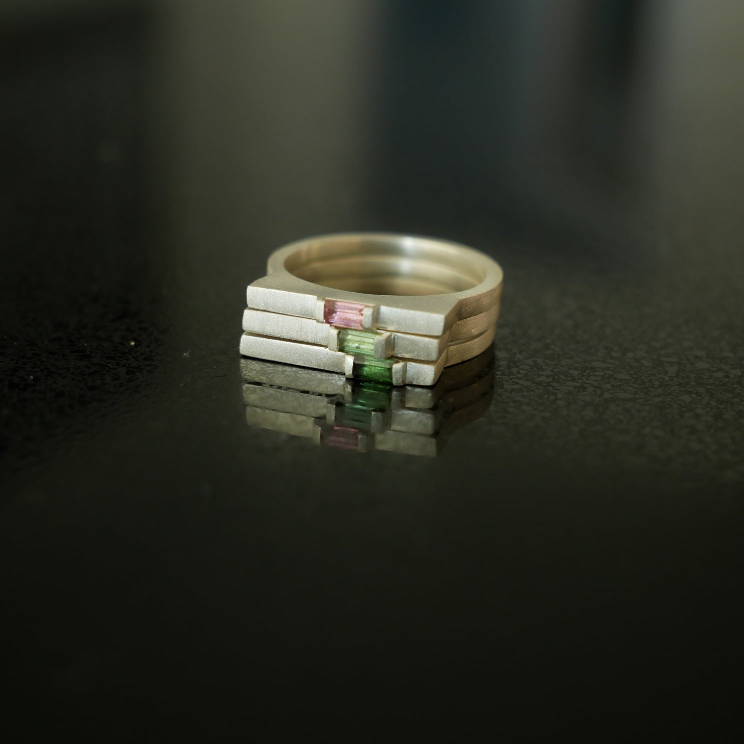 Set of three narrow architect rings with baguette tourmalines