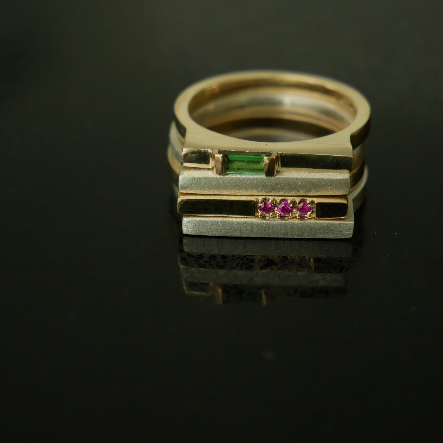 narrow silver and gold architect rings