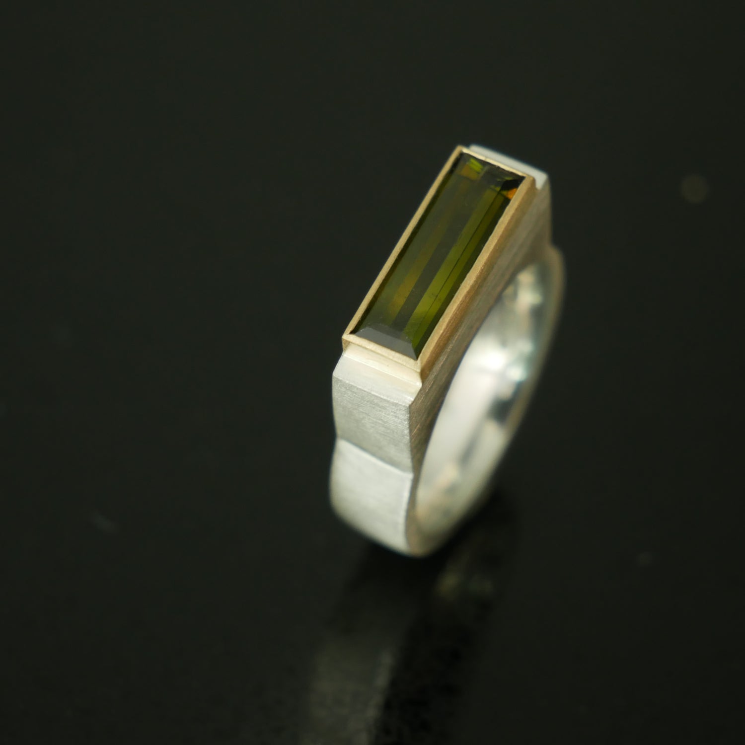 Silver chunky architect ring with green tourmaline