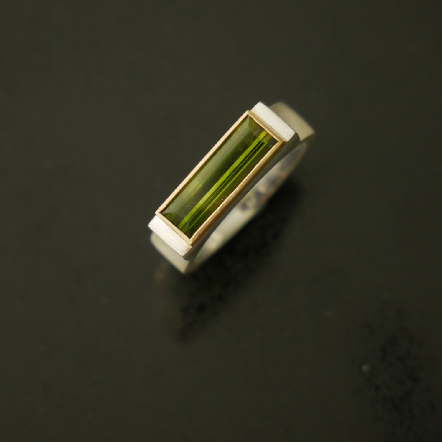 Silver chunky architect ring with green tourmaline