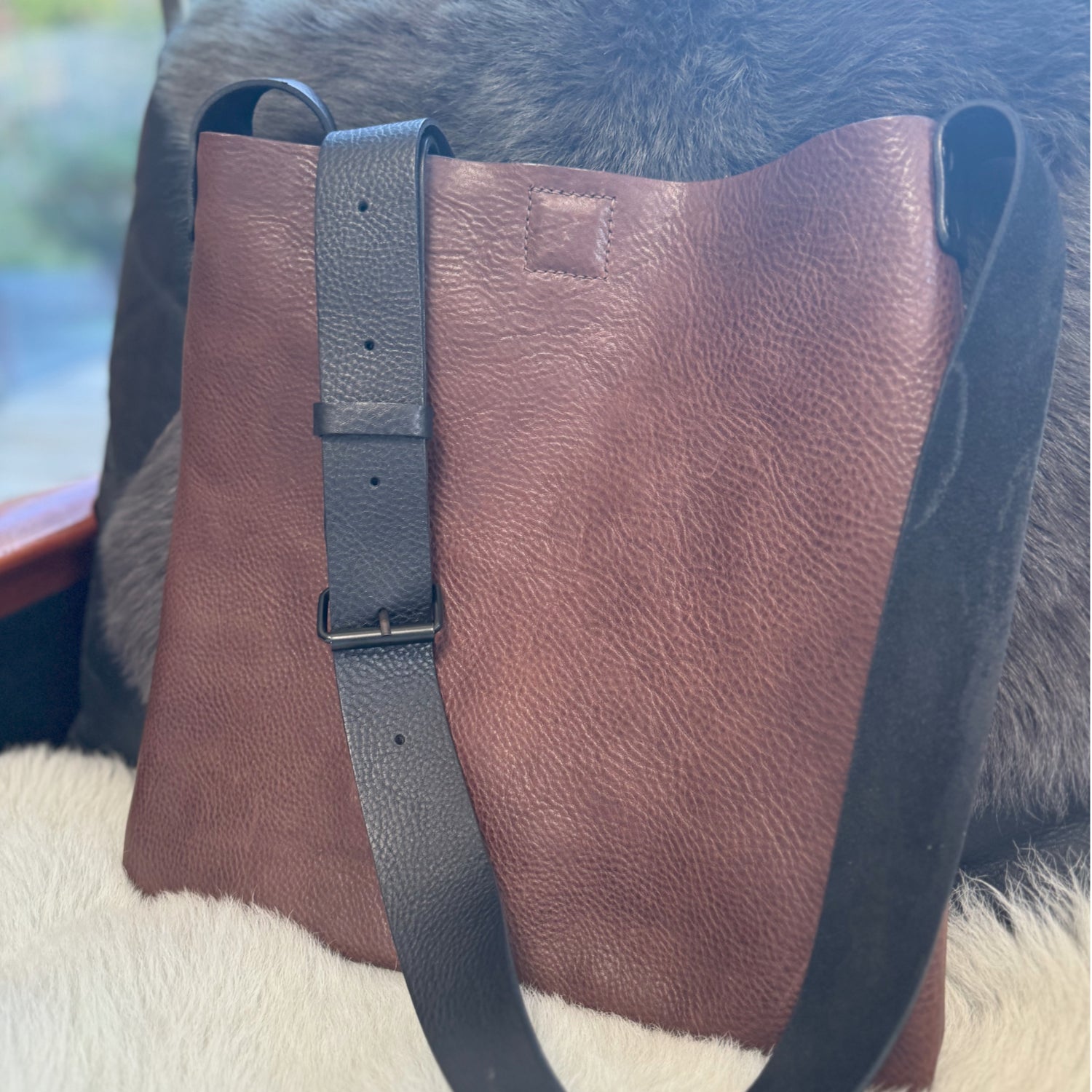 brown leather crossbody bag