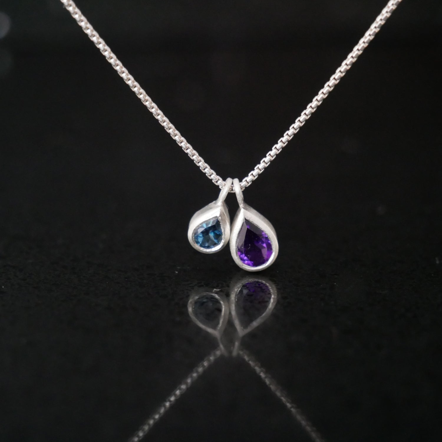 Amethyst and london blue topaz pendant