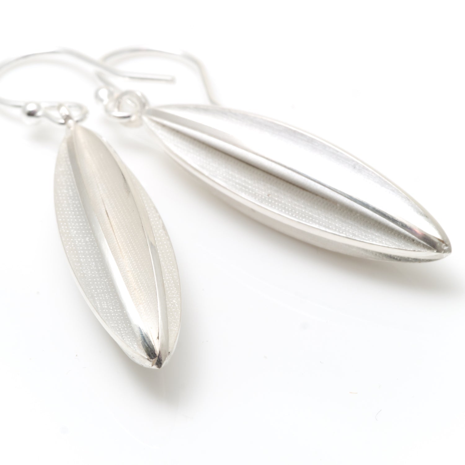 silver long pod earrings