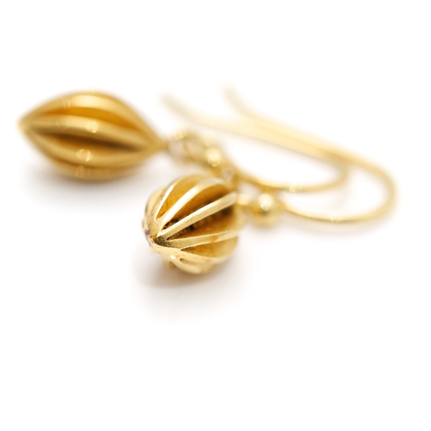 tiny gold plated pod earrings