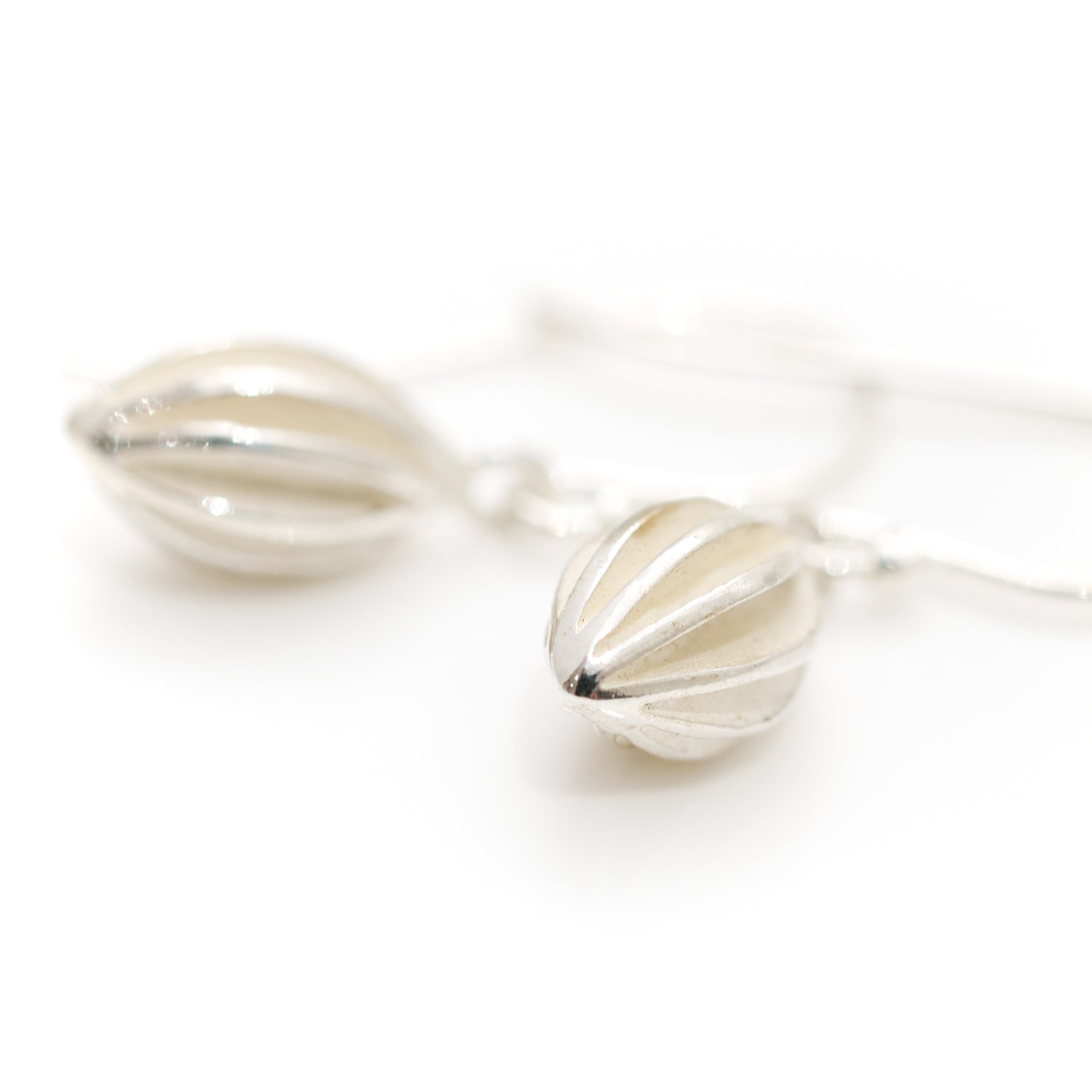 silver pod drop earrings