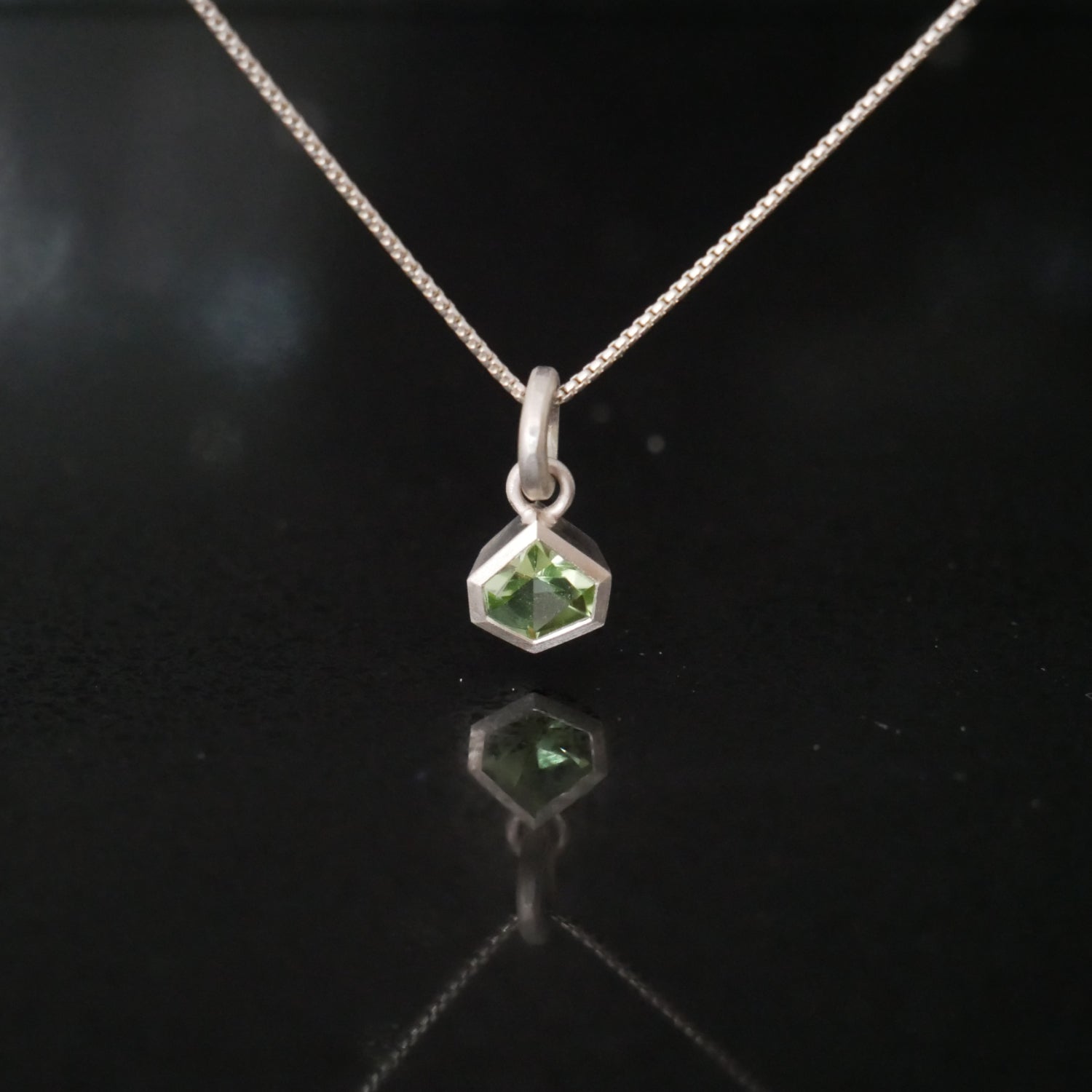 peridot geometric silver necklace