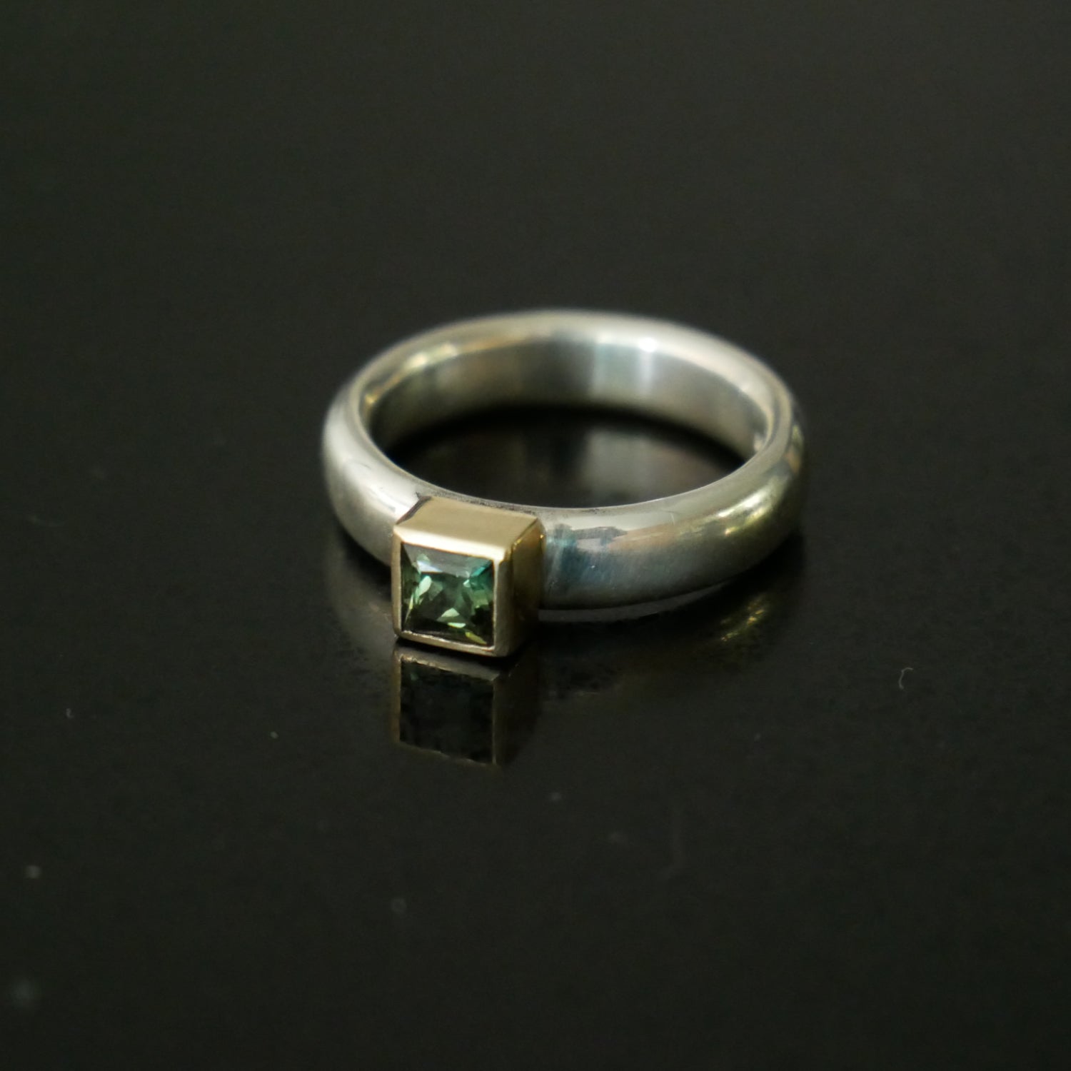 square green sapphire gold and silver ring