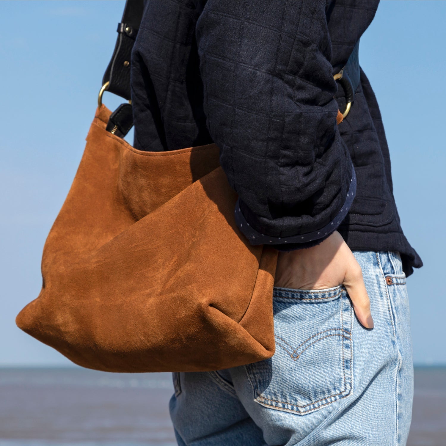 conquer coloured suede shoulder bag