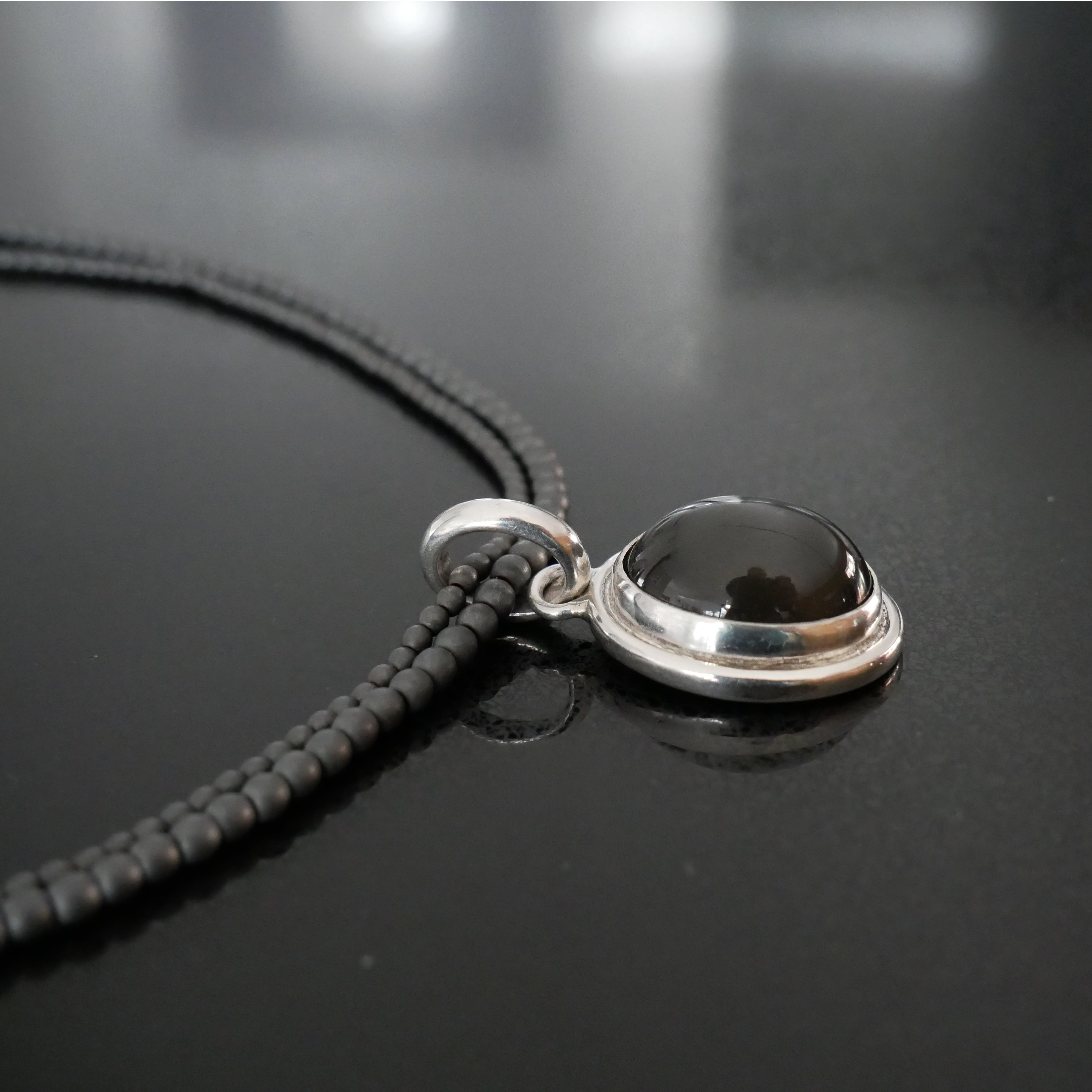 silver and black moonstone pendant