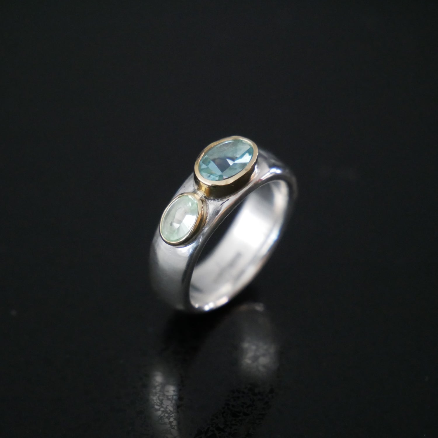 gold and silver wide ring with aquamarine and tourmaline