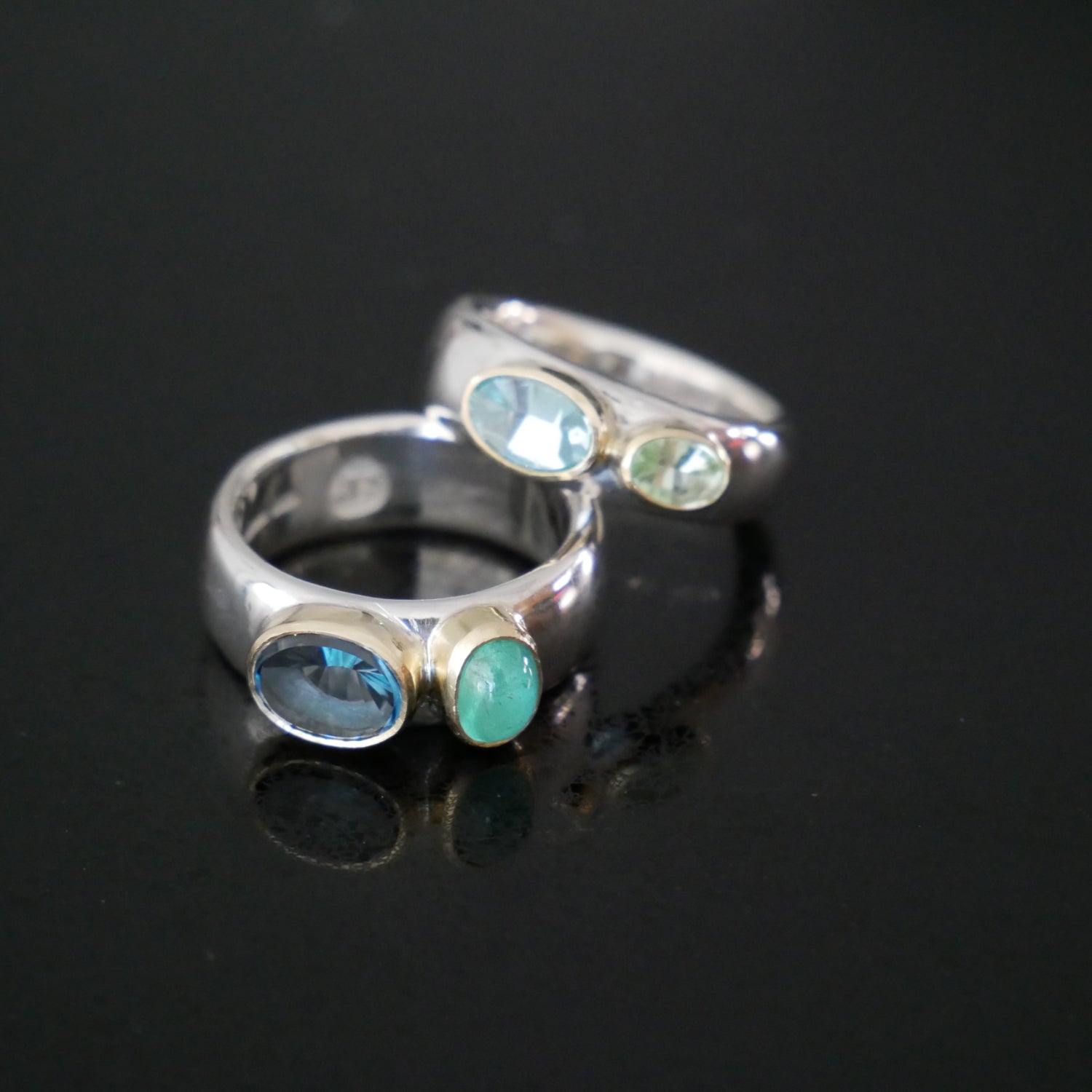Wide silver and gold rings with semi precious stones
