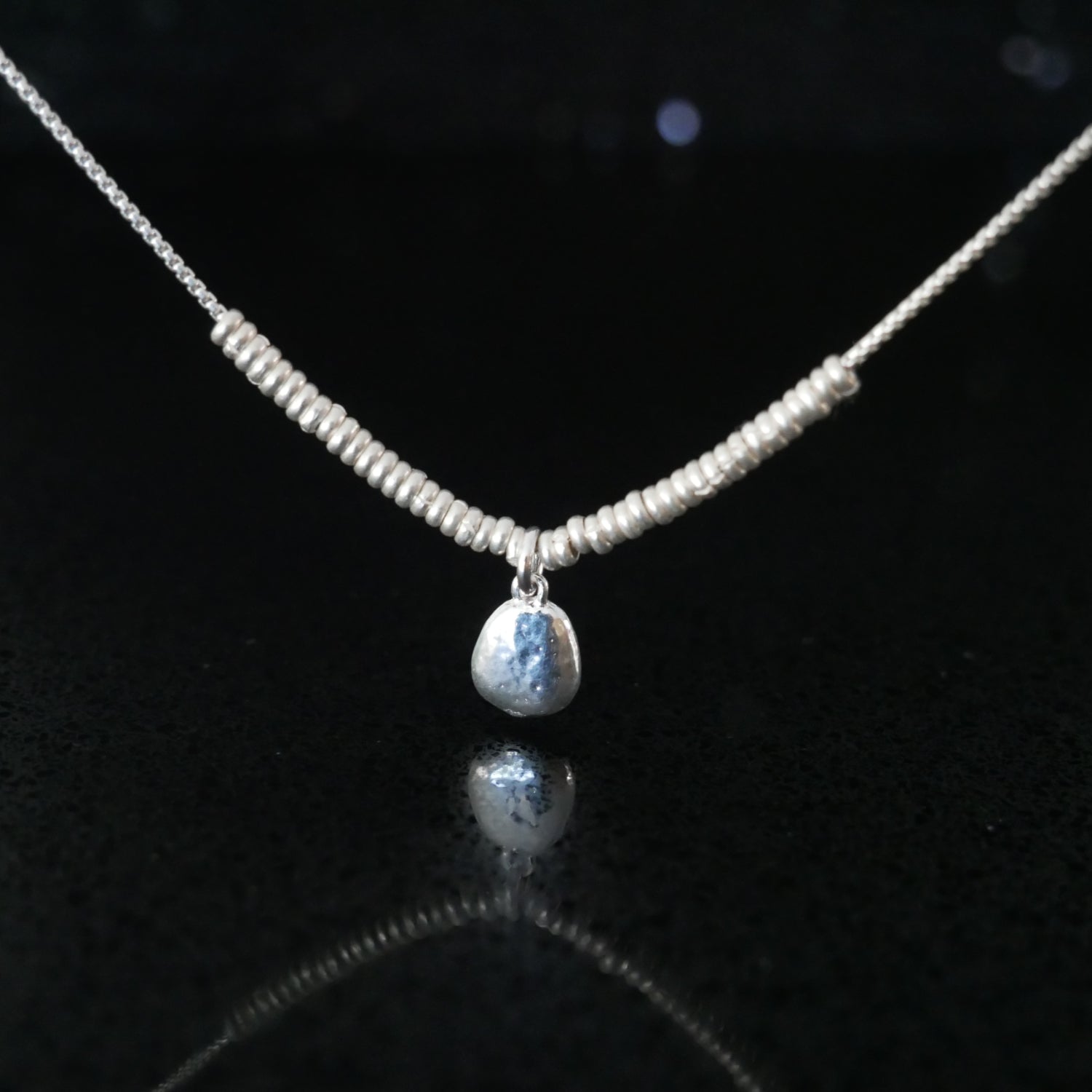 tiny silver pebble necklace