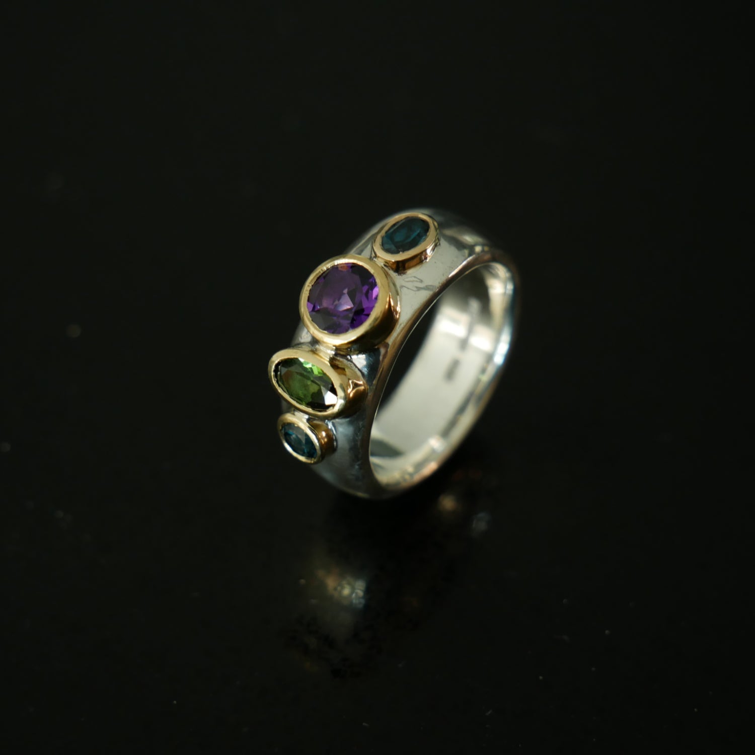 Gold and silver chunky ring with 4 gemstones
