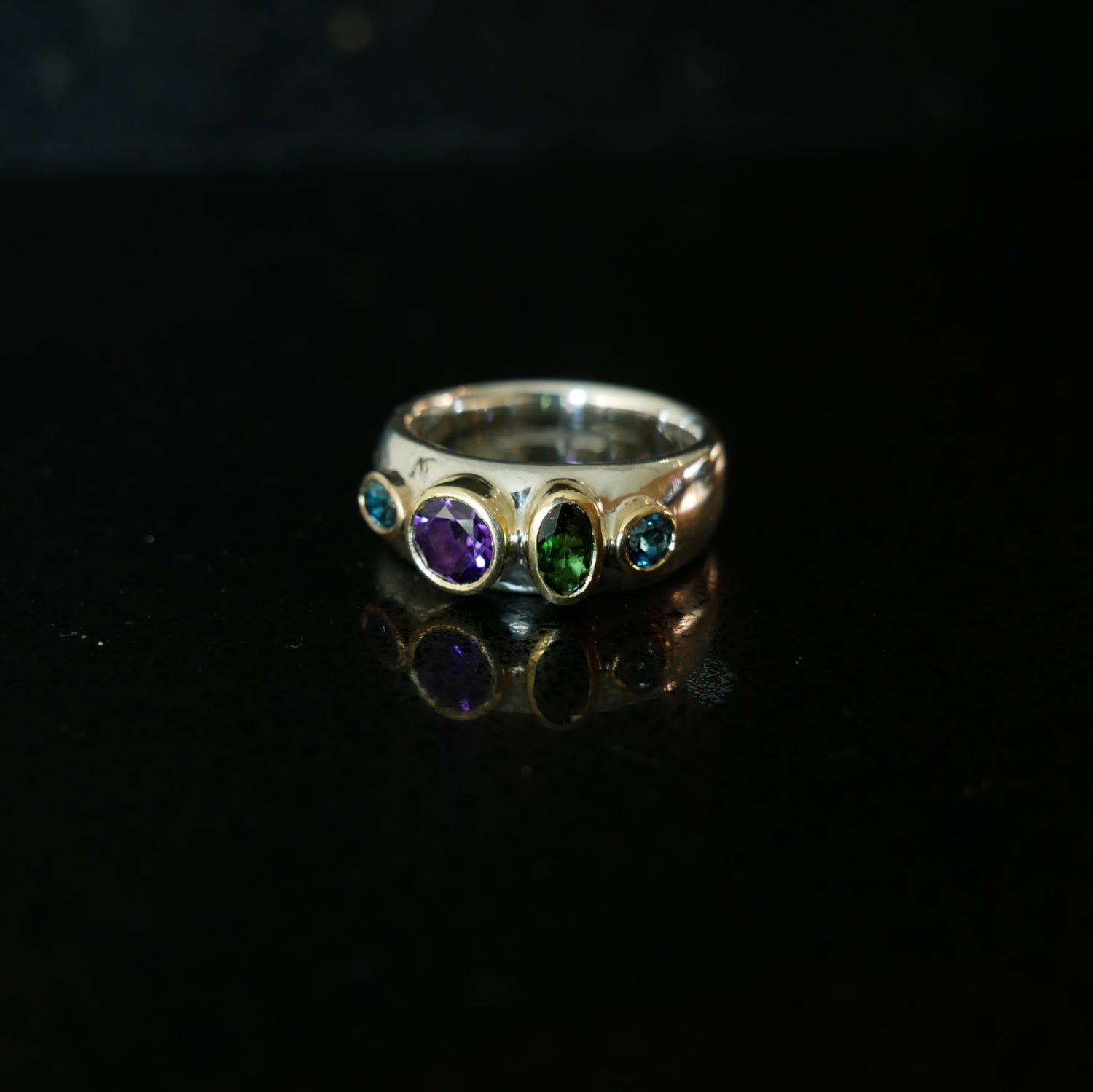 Gold and silver chunky ring with 4 gemstones