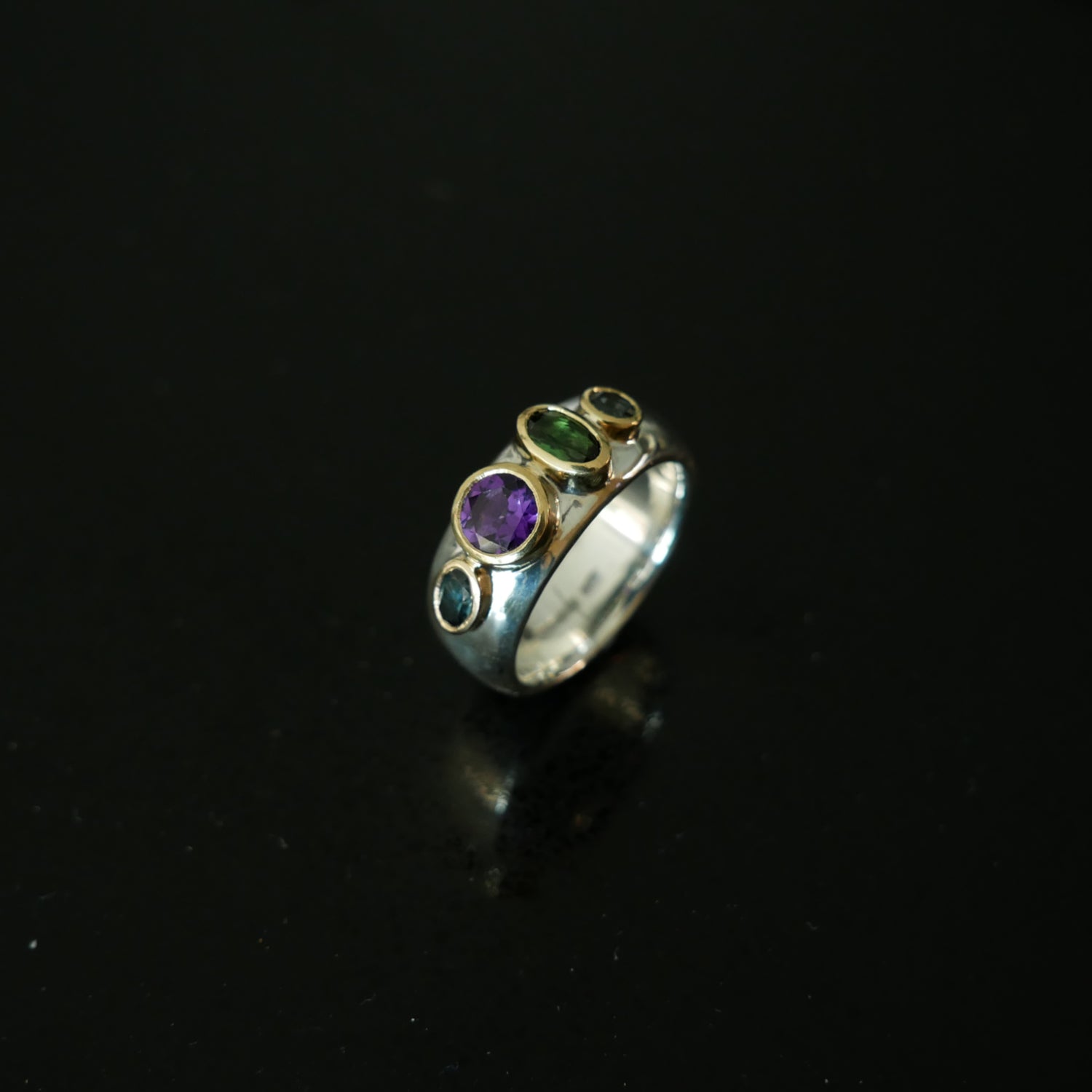 Gold and silver chunky ring with 4 gemstones