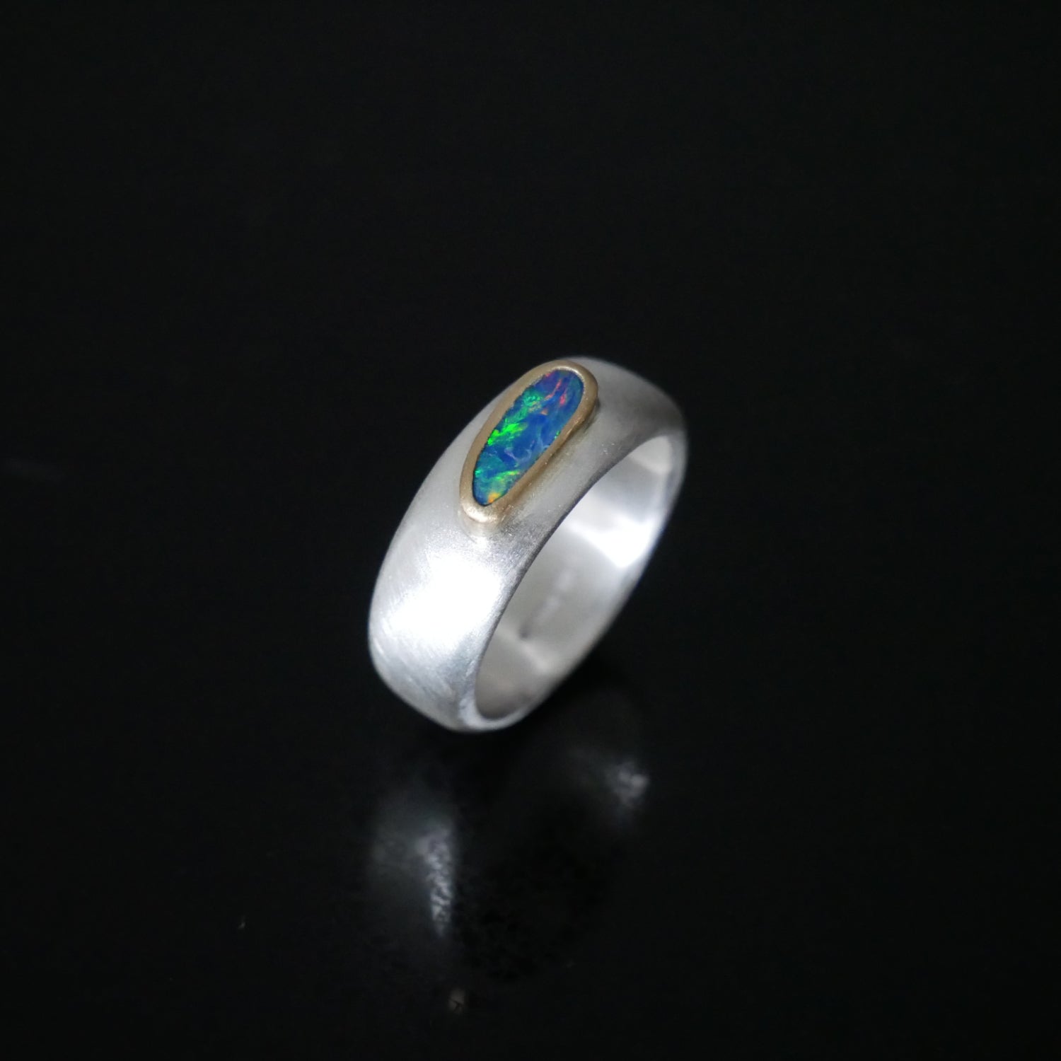 silver and gold wide ring with Opal
