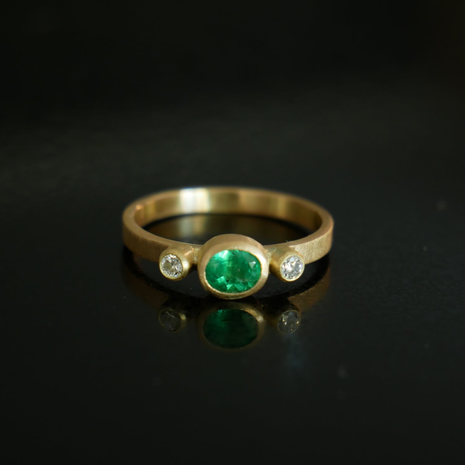 18ct gold emerald and diamond ring