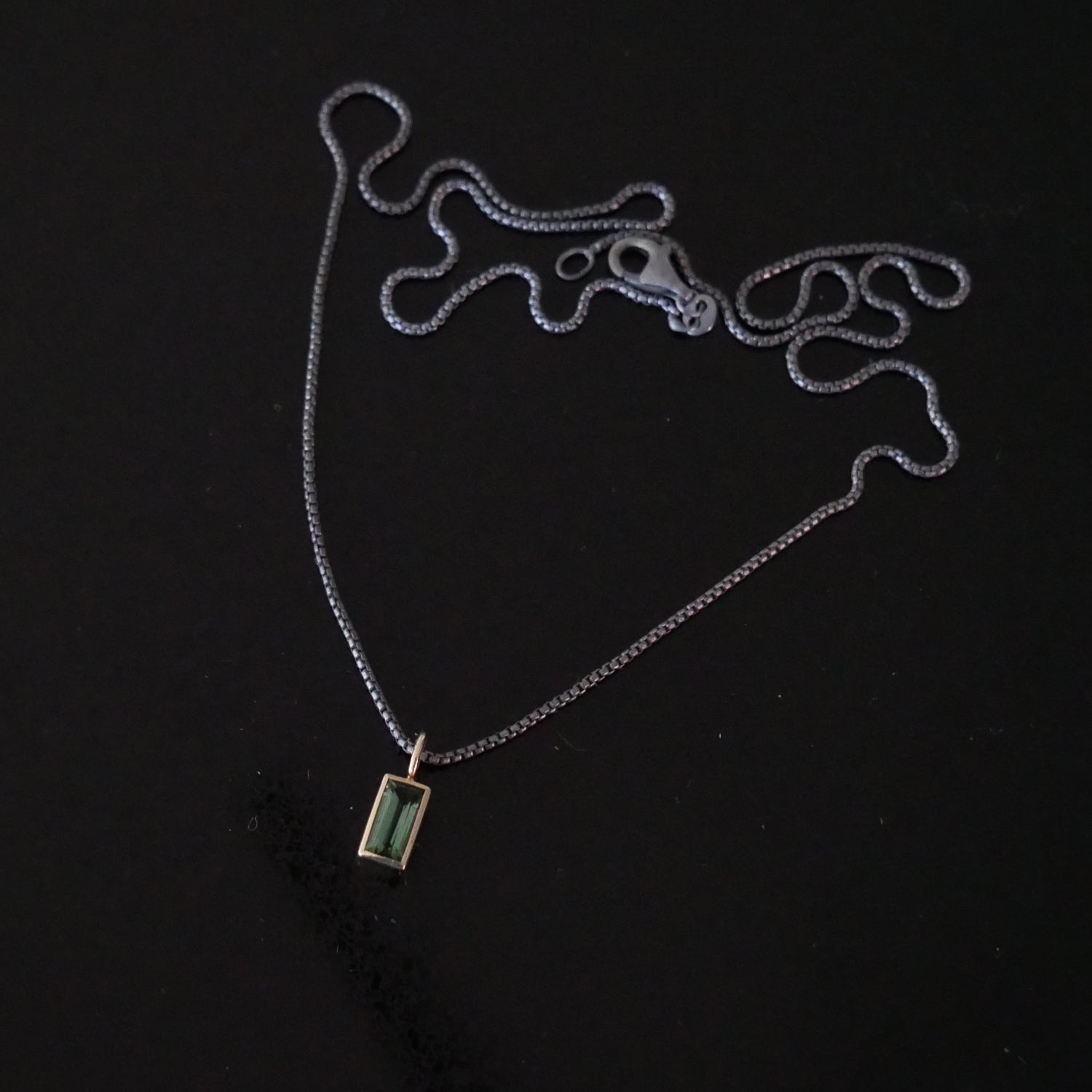 Tiny 9ct gold tourmaline baguette pendant