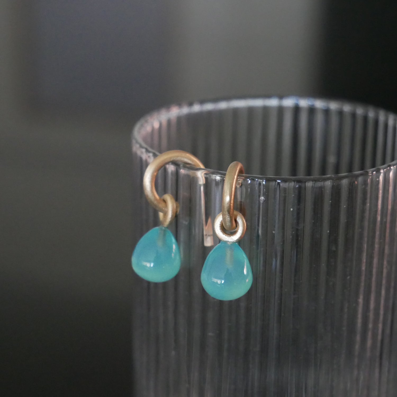 Tiny 9ct gold hoops with Chalcedony drops