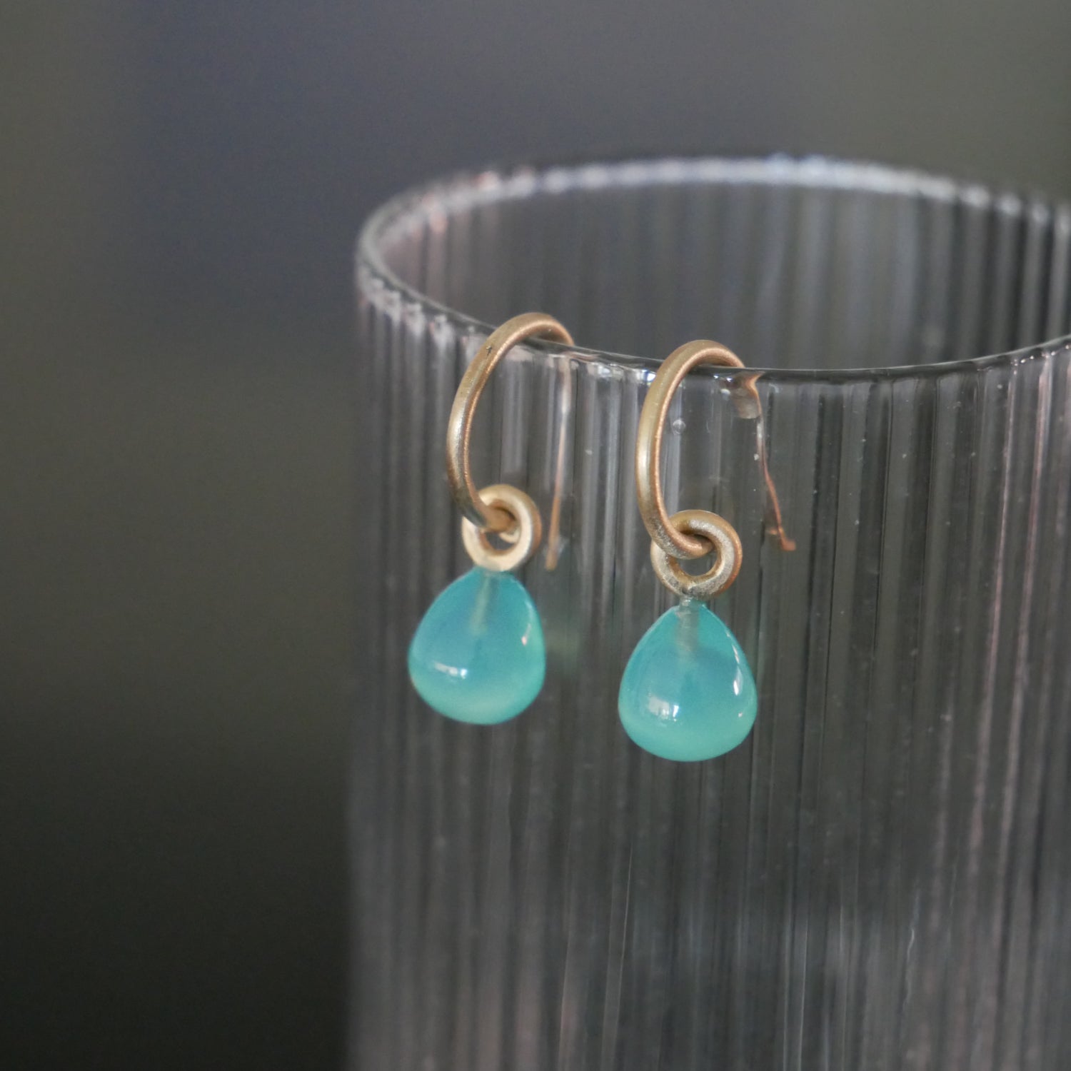 Tiny 9ct gold hoops with Chalcedony drops