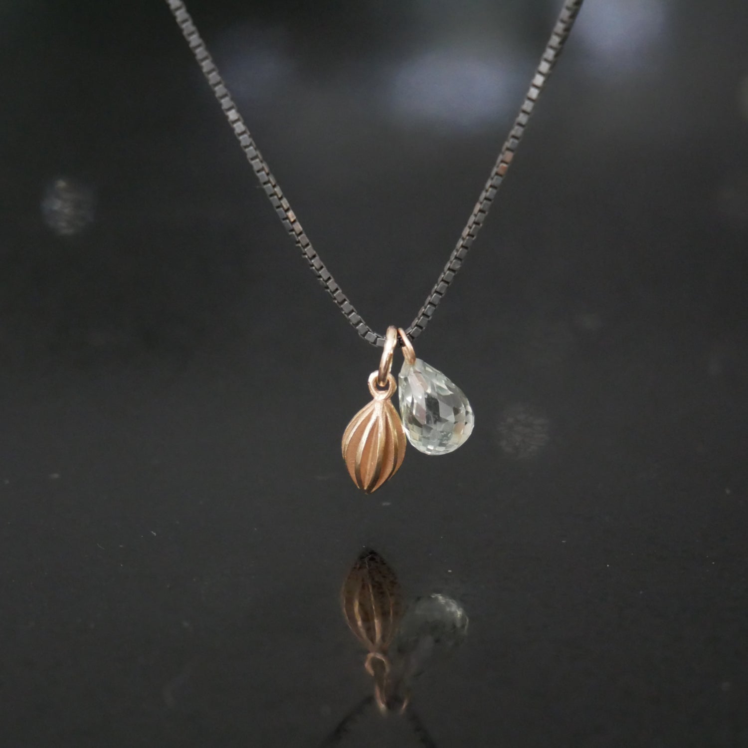 Tiny 9ct pod necklace with green quartz briolette