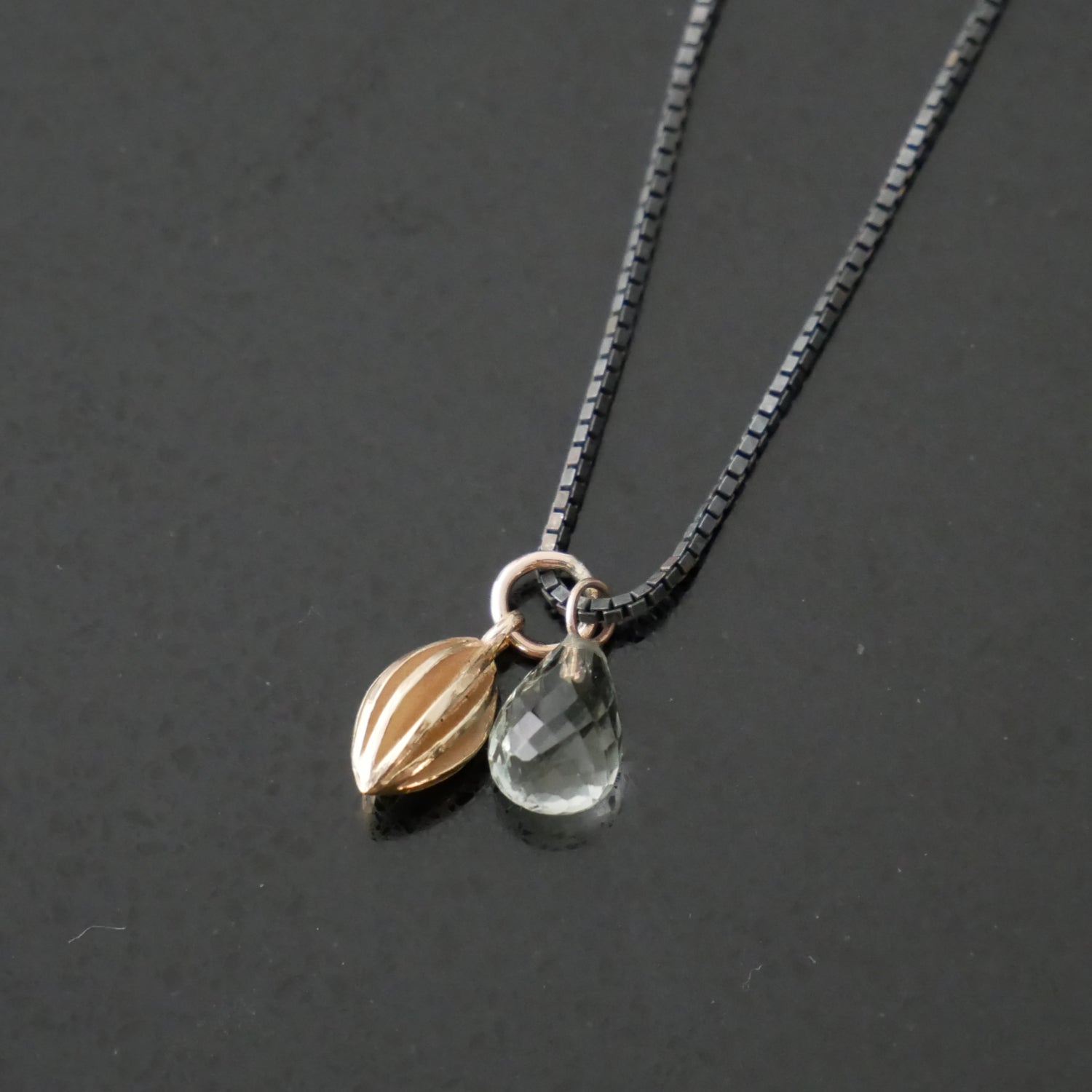 Tiny 9ct pod necklace with green quartz briolette