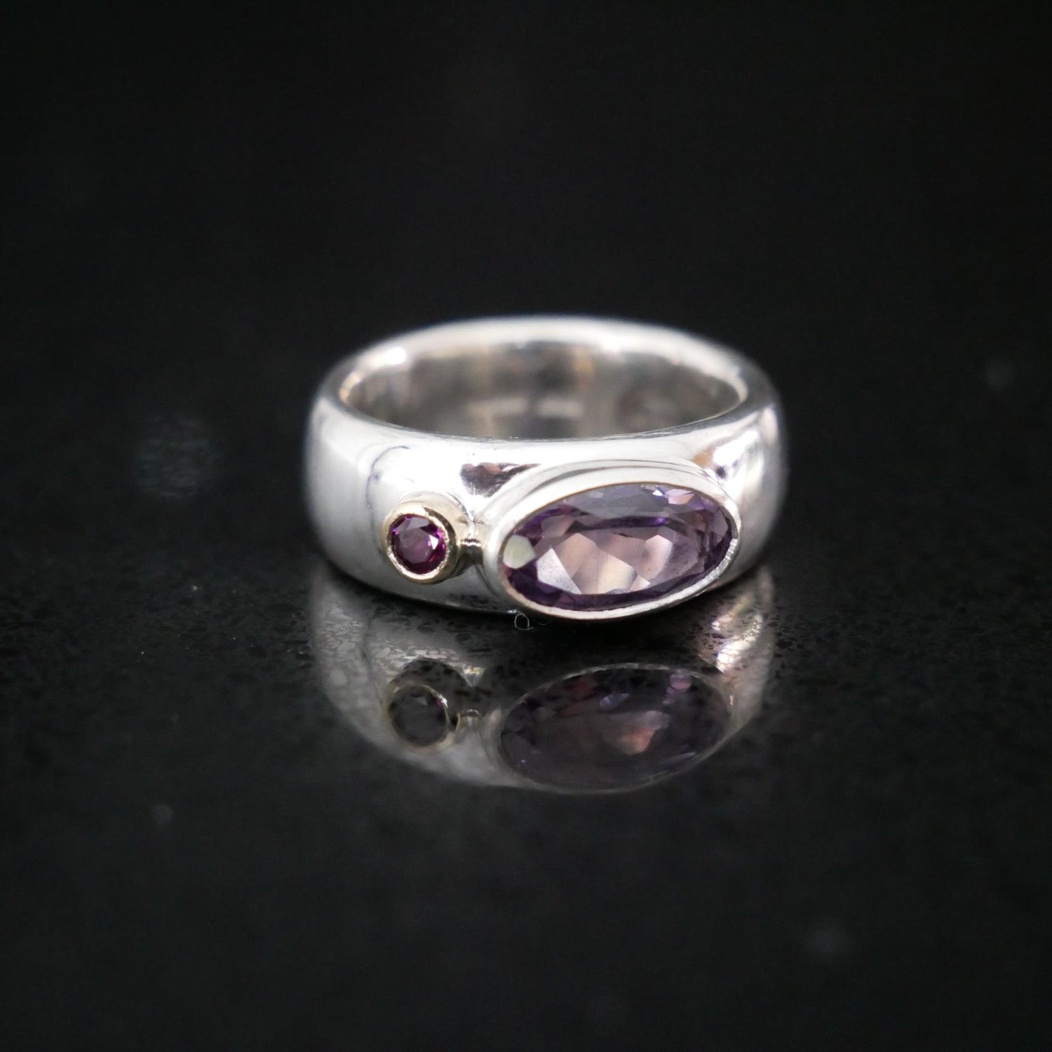 Wide Silver ring with Amethyst and Rhodelite garnet
