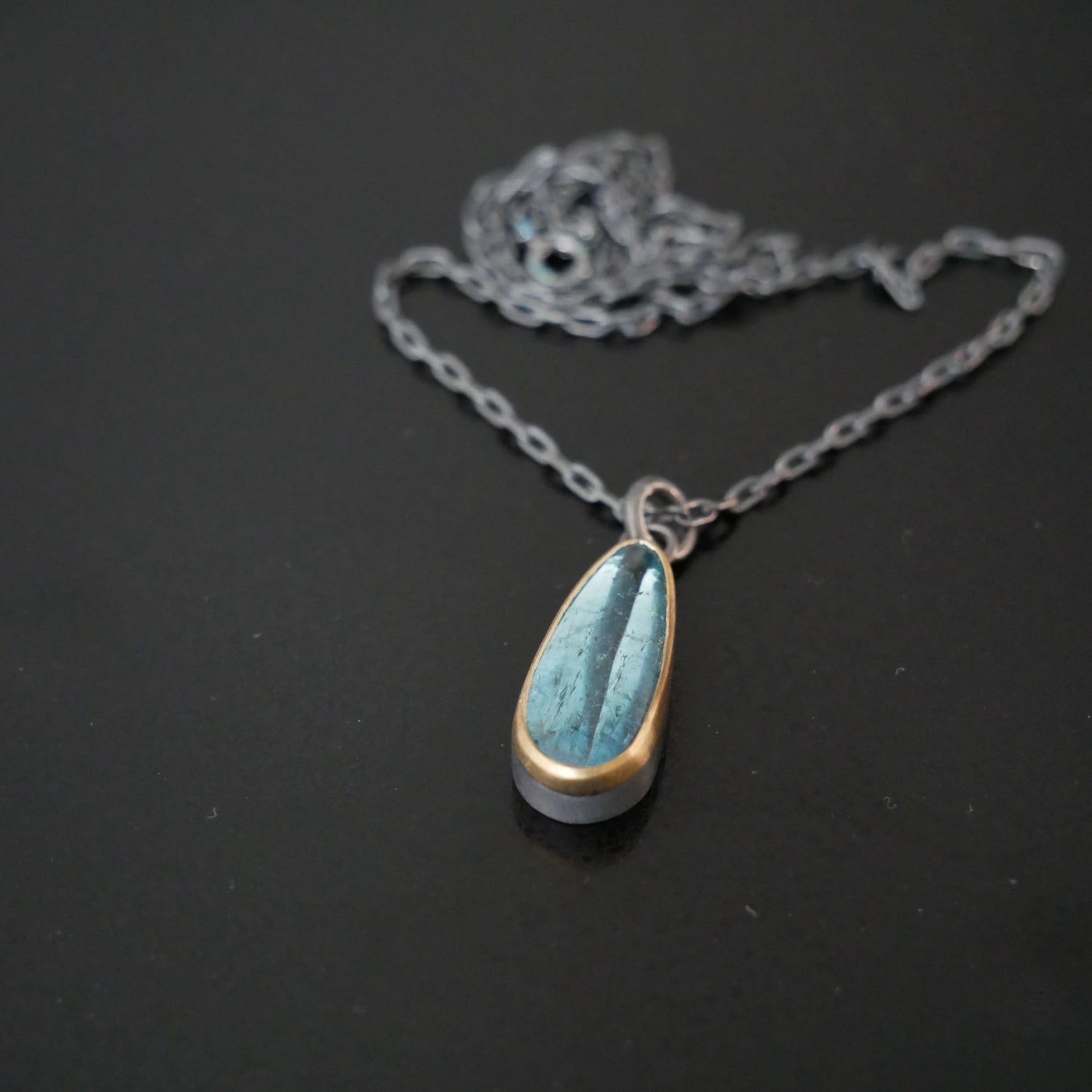 Gold and silver Aquamarine pendant