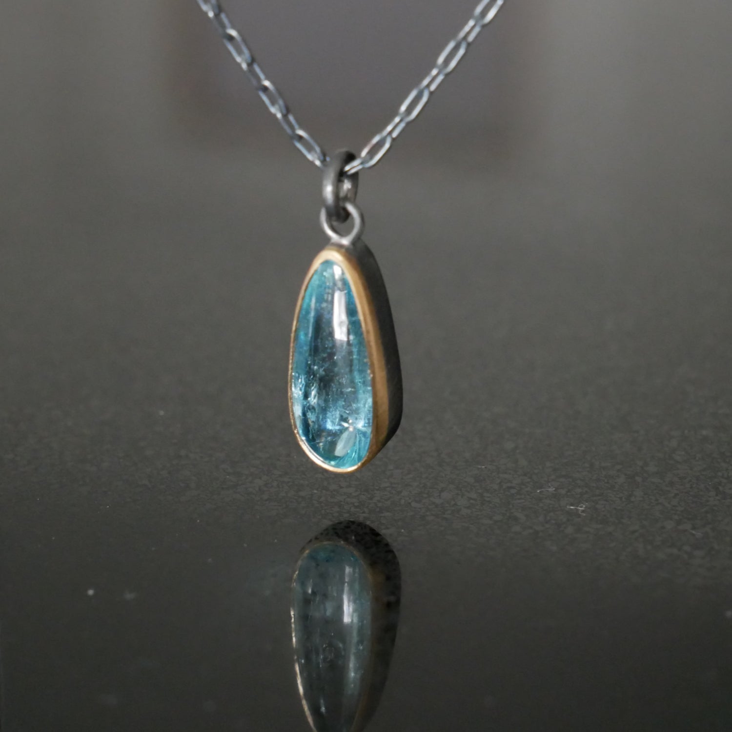 Gold and silver Aquamarine pendant