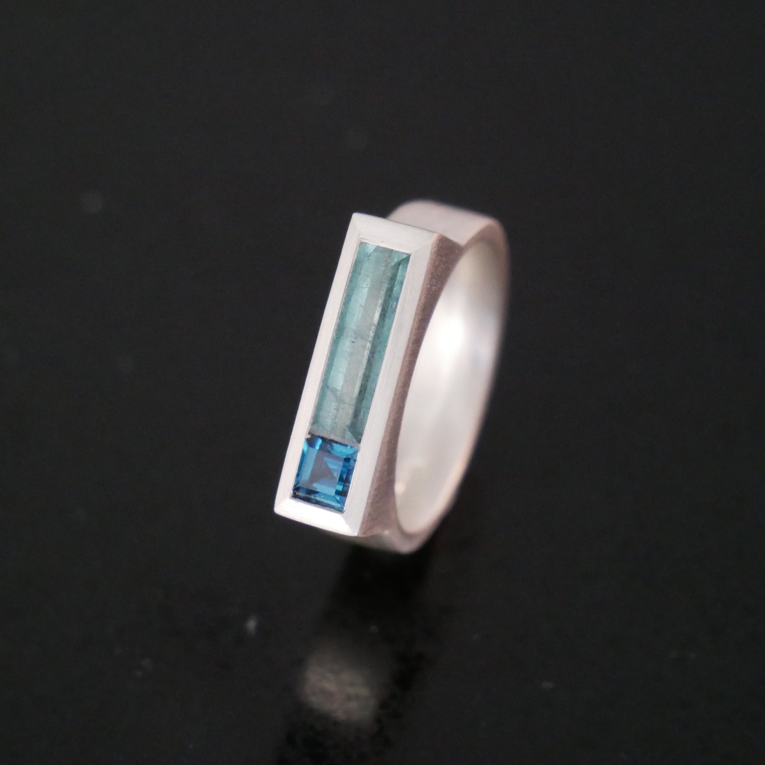 Blue tourmaline and topaz ring