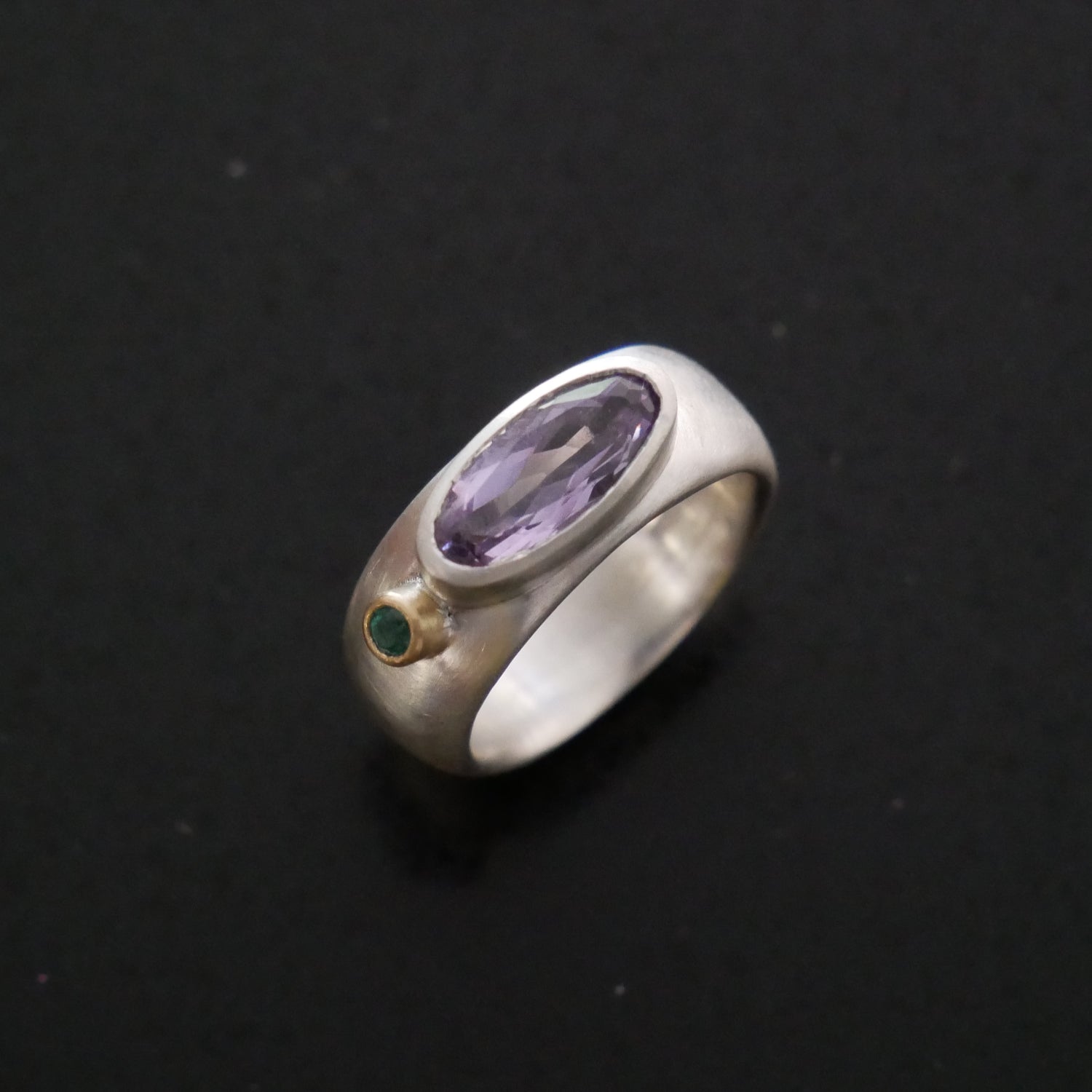 Amethyst and emerald wide silver ring