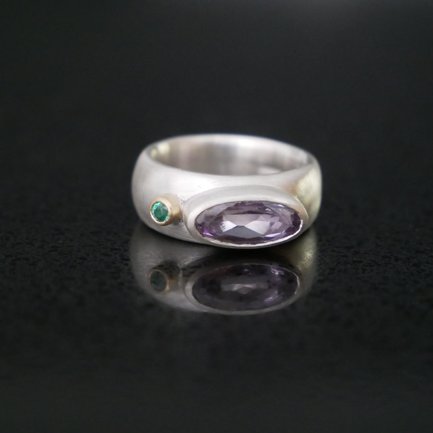 Amethyst and emerald wide silver ring