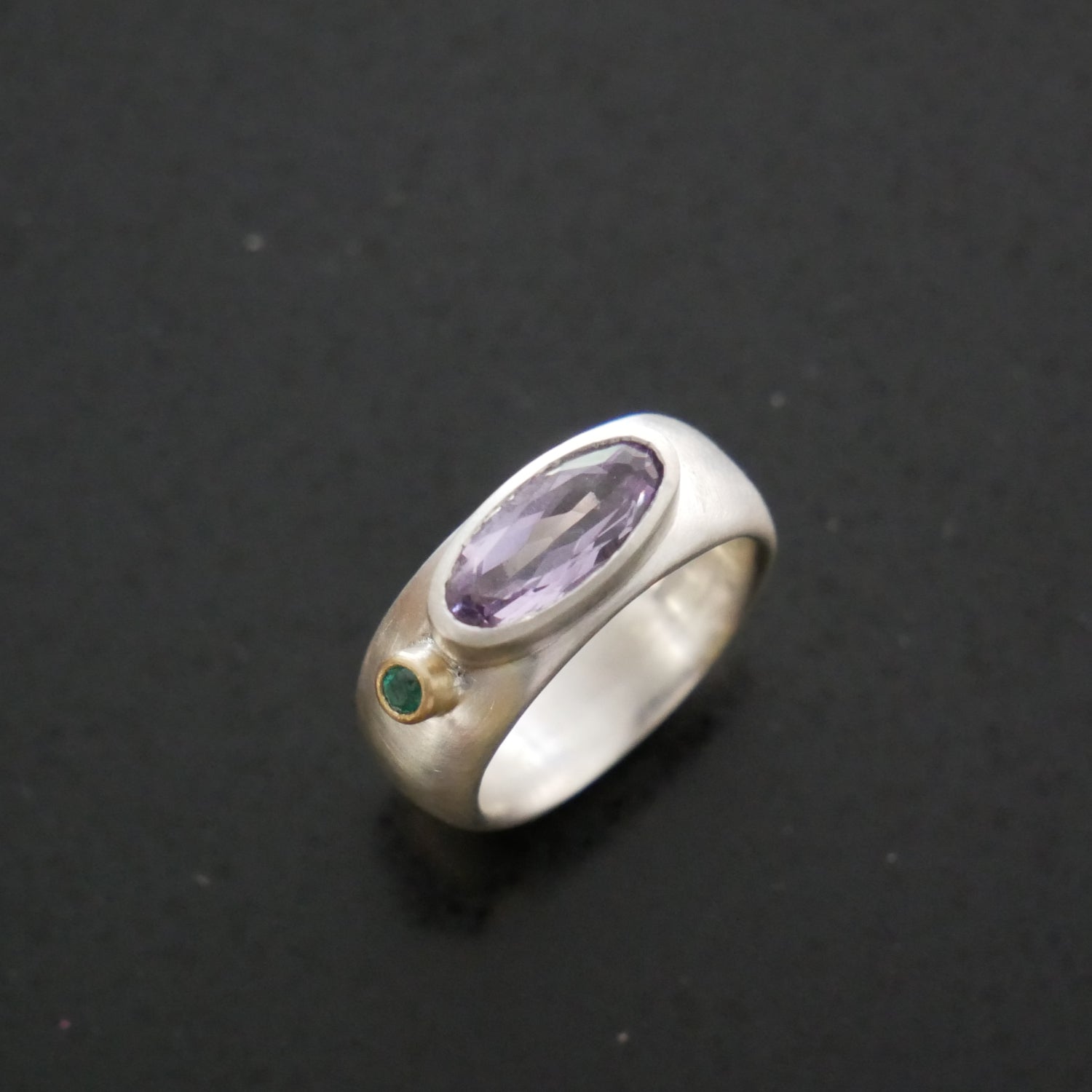 Amethyst and emerald wide silver ring