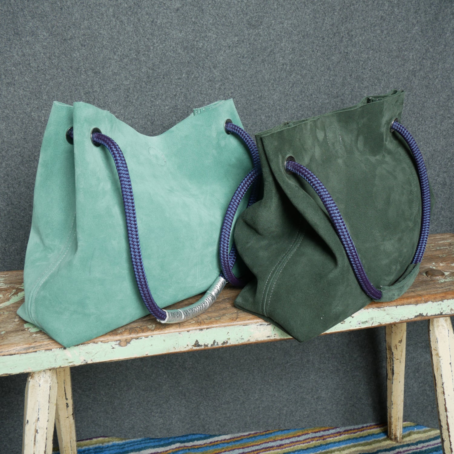 Green and aqua suede shoulder bag