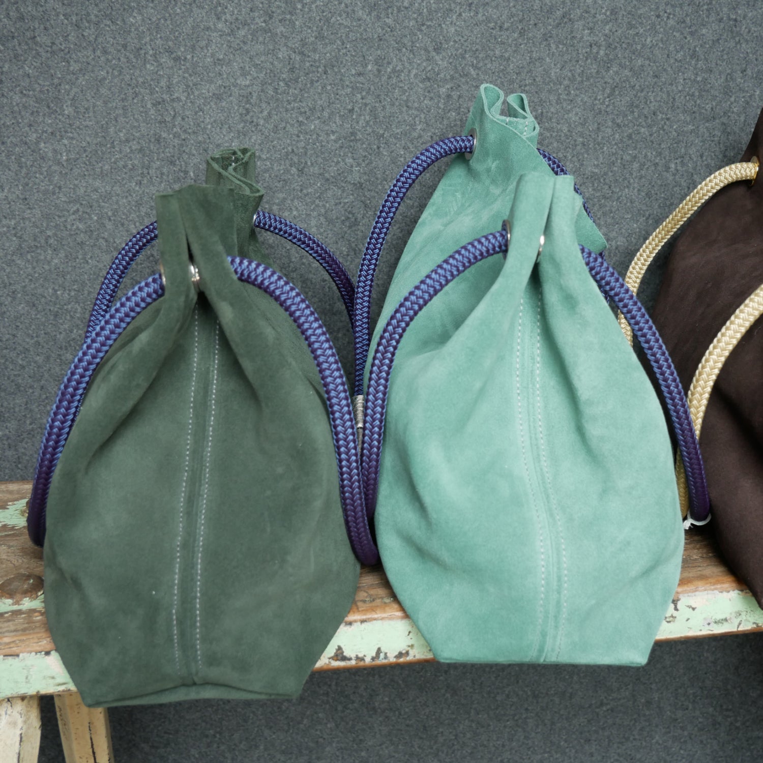 Green and aqua suede shoulder cord bag