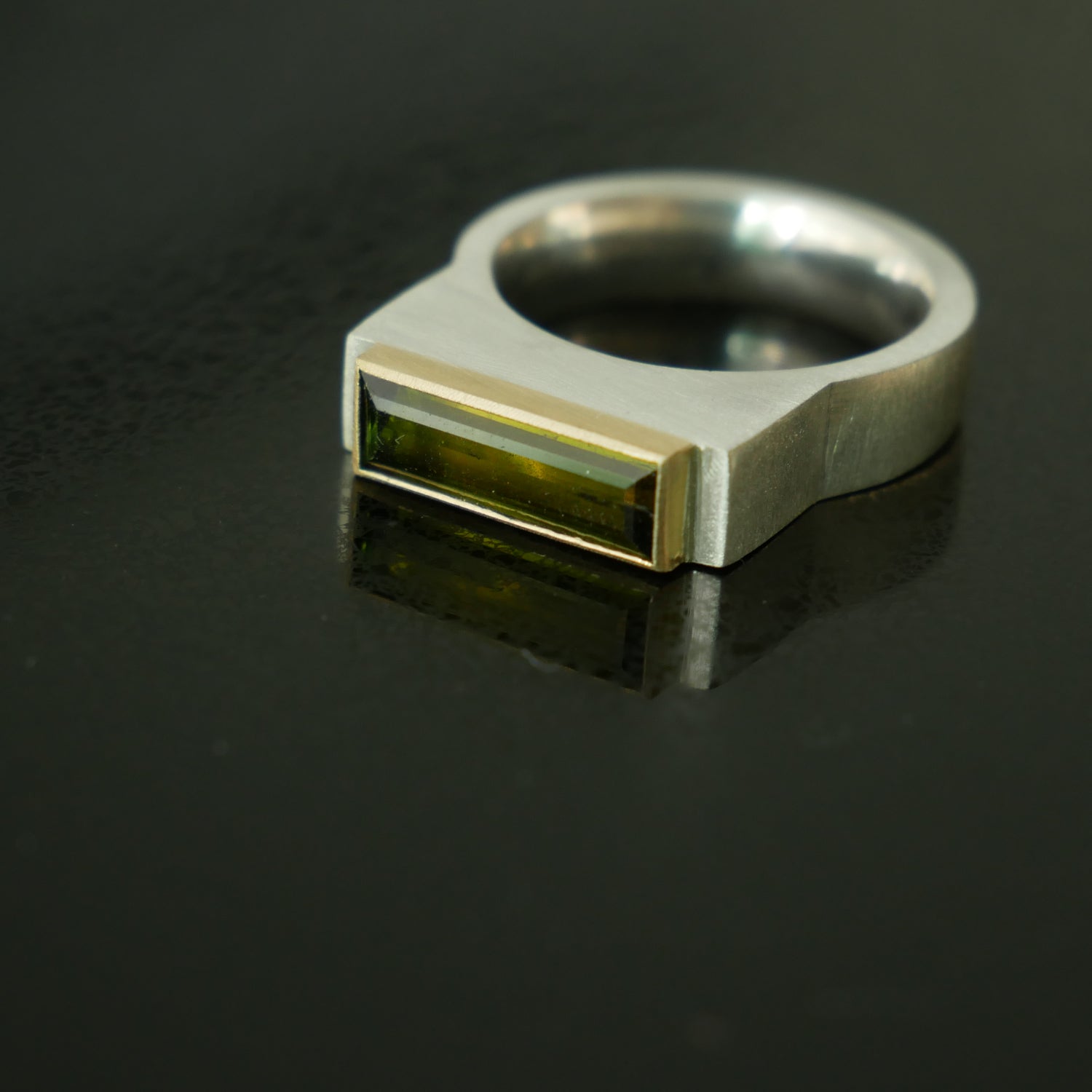 Silver chunky architect ring with green tourmaline