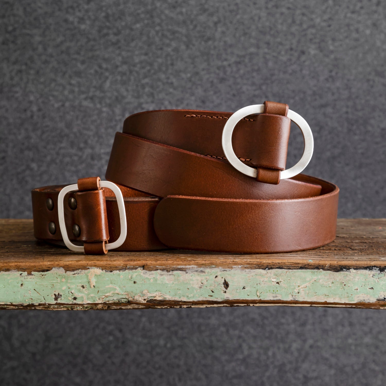 silver buckled handstitched belts