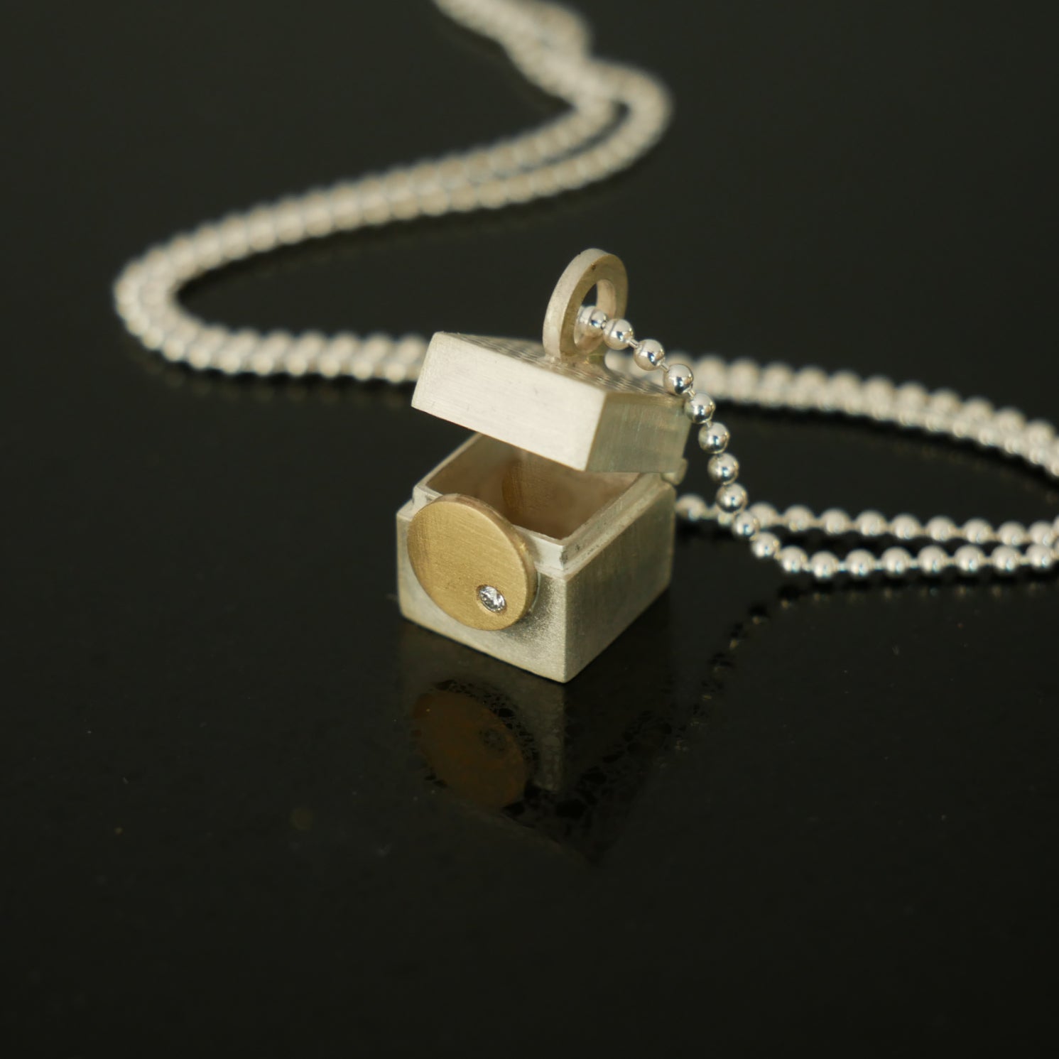 Tiny silver, gold and diamond box pendant