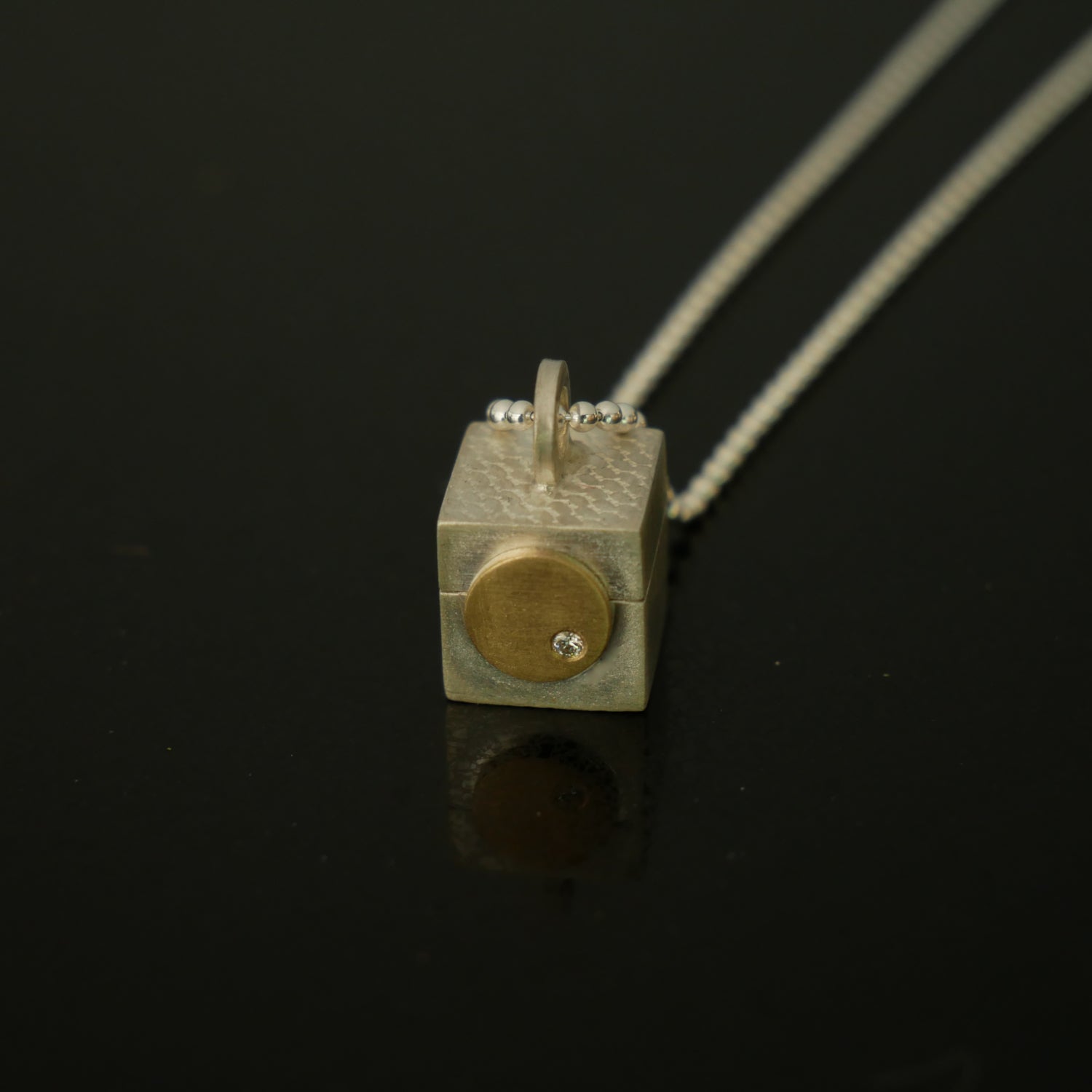 Tiny silver, gold and diamond box pendant