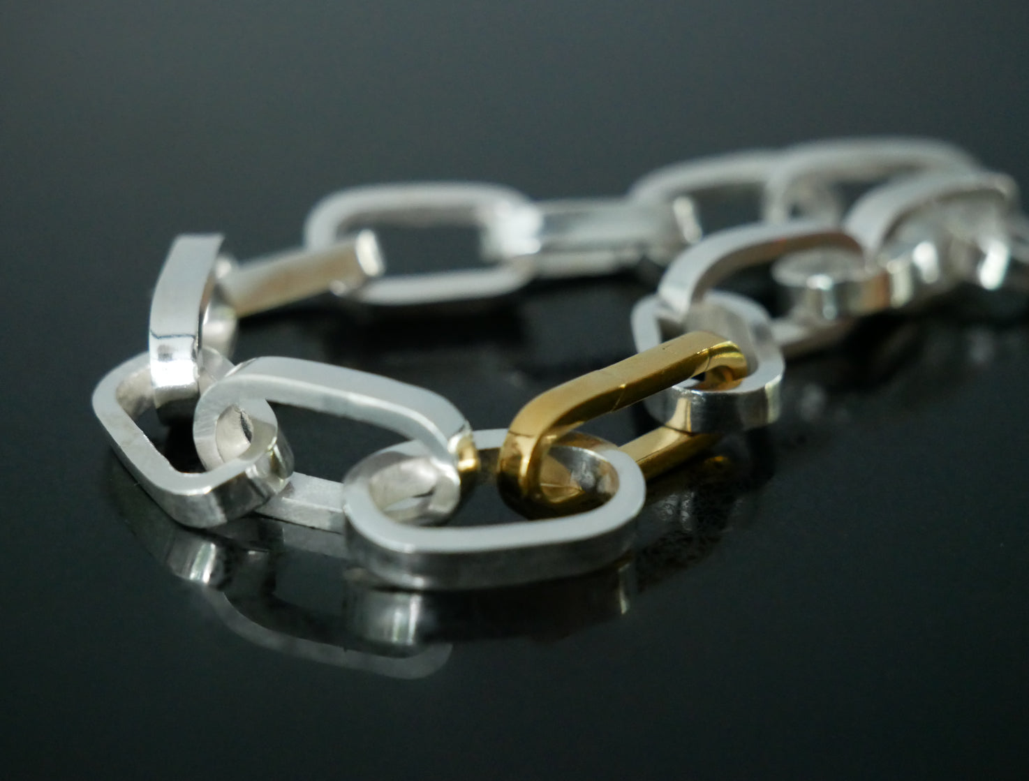 silver and gold link bracelet