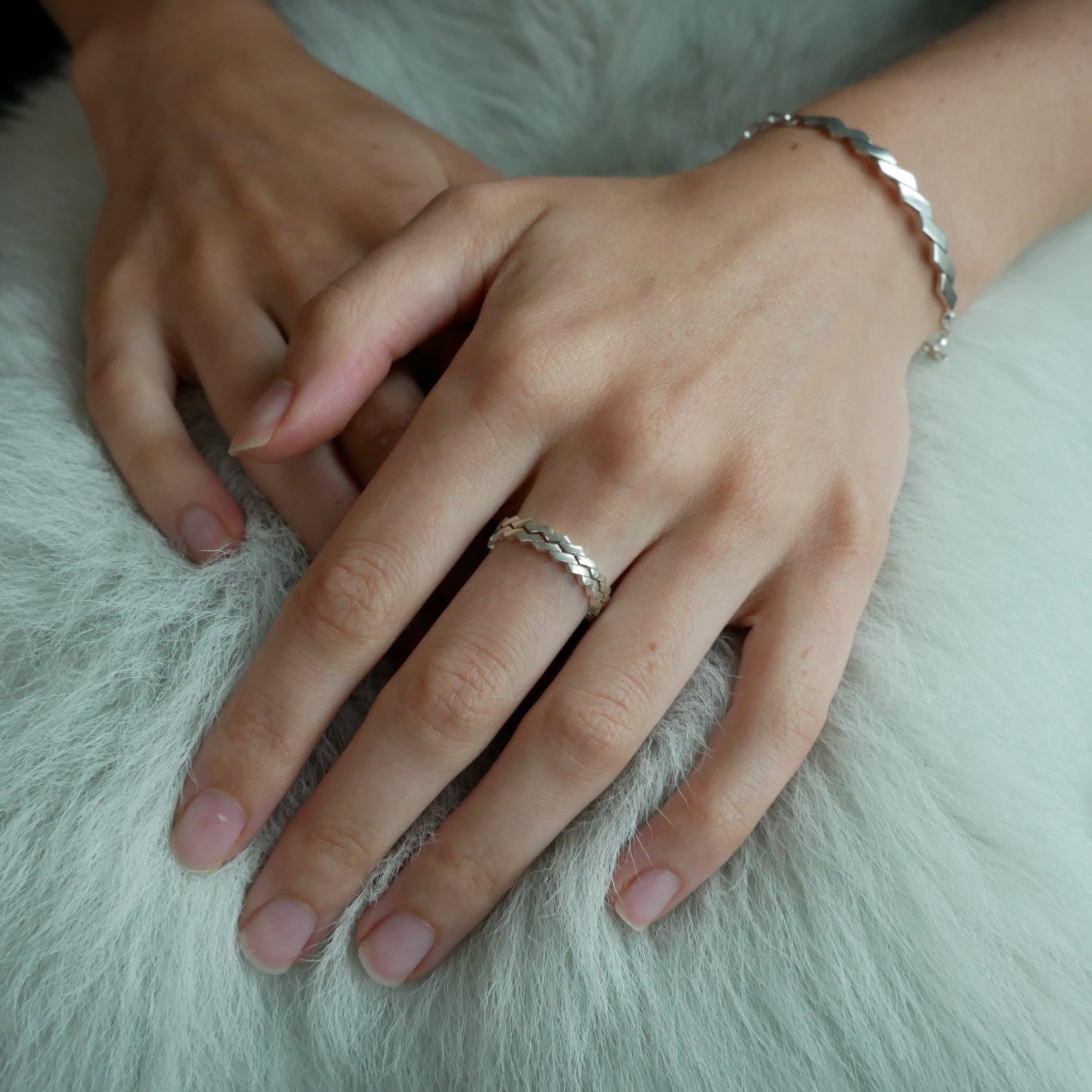 silver zigzag bracelet and rings