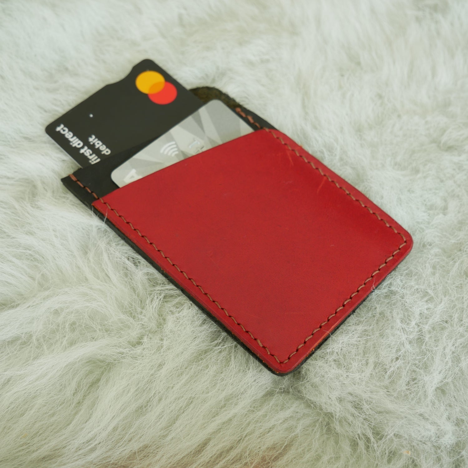 Hand-stitched leather card holder