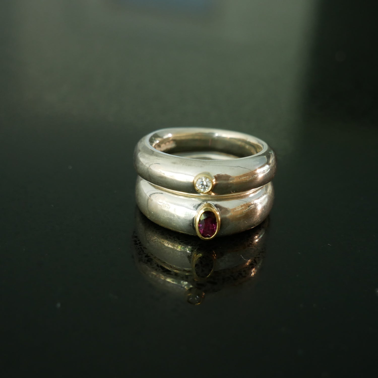 Chunky silver and gold rings with gemstones