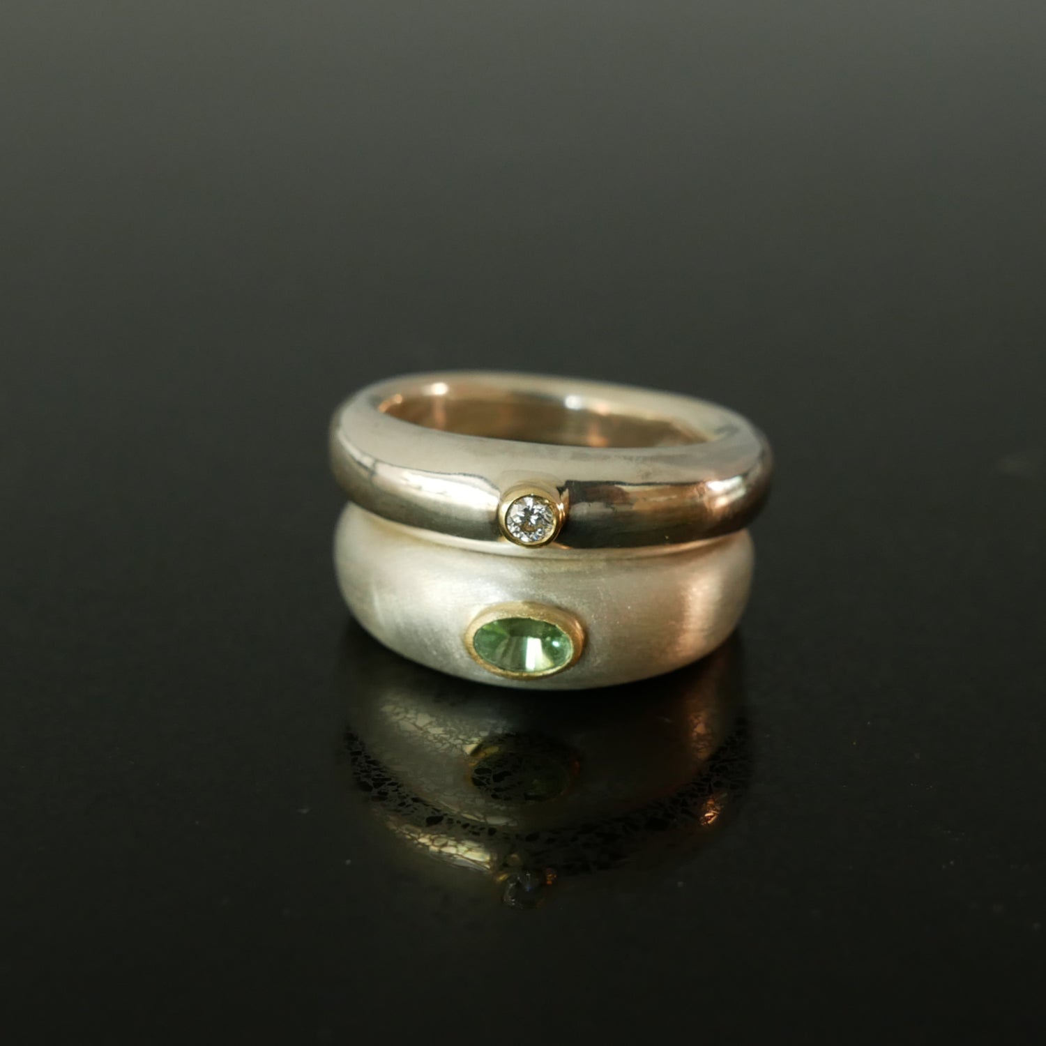 Chunky silver and gold rings with gemstones