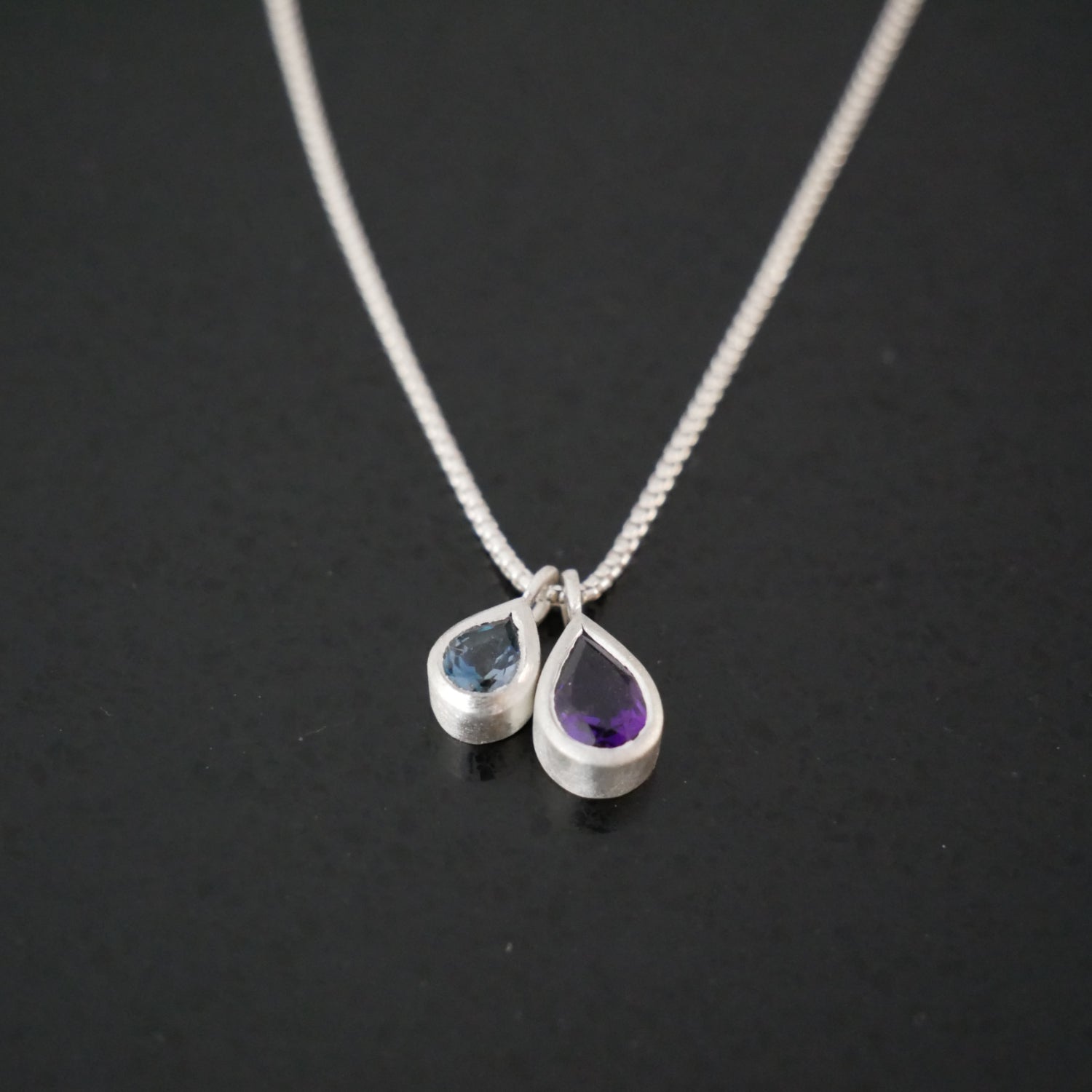 Amethyst and london blue drop pendant